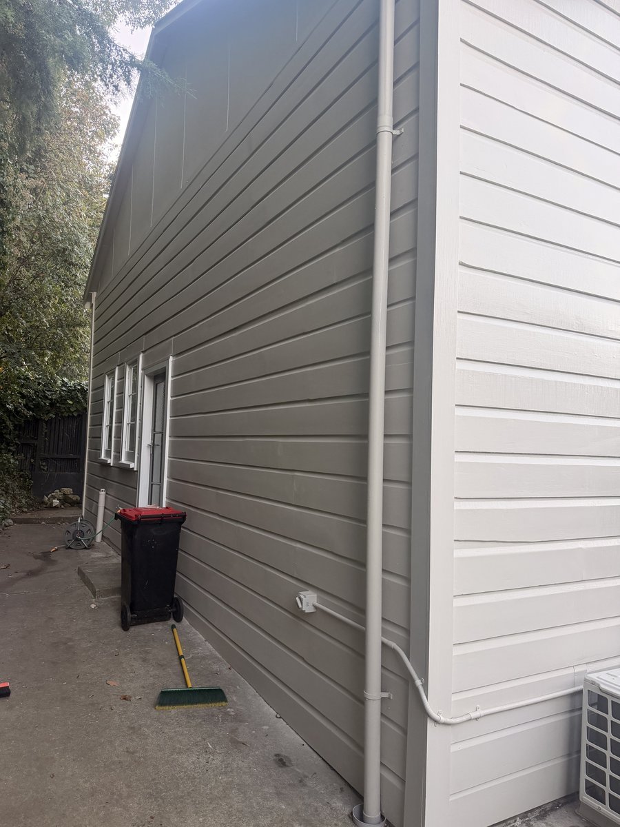 coote-road-exterior-grey-weatherboard-side-elevation.jpg