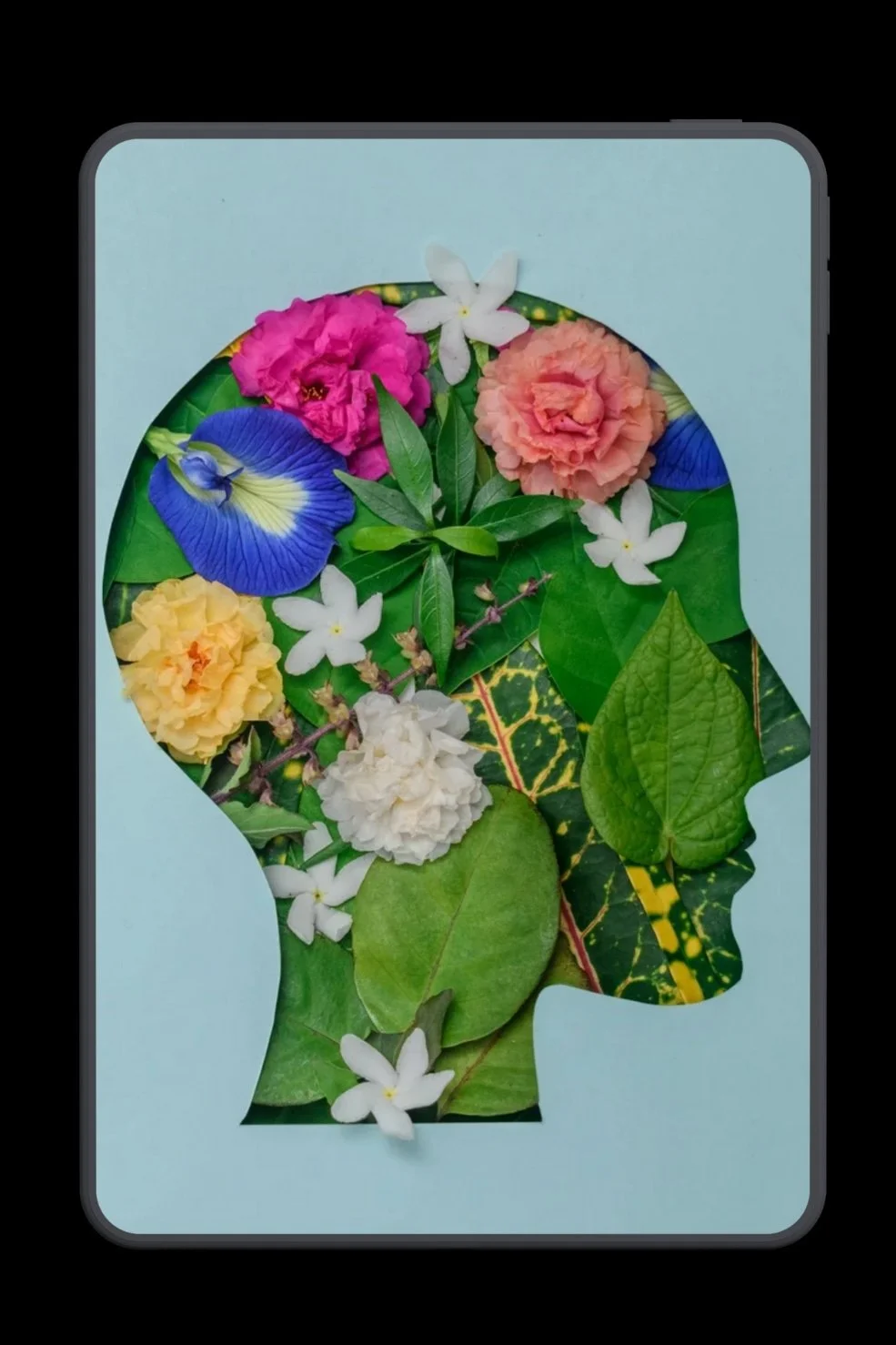 A smartphone screen displays a colorful collage of various flowers and green leaves, arranged in the shape of a human head silhouette.