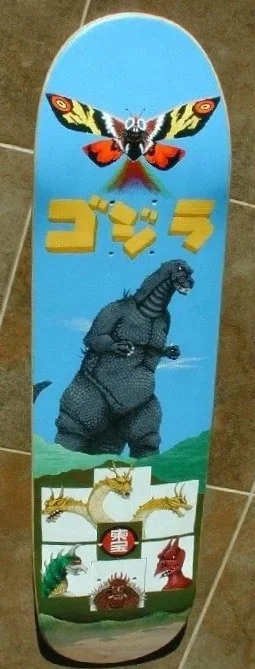 Skateboard deck with Godzilla, Mother, King Ghidorah, Gigan, Anguirus, and Rodan