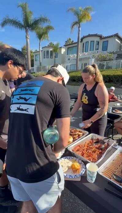 The teams eat together during camp week.