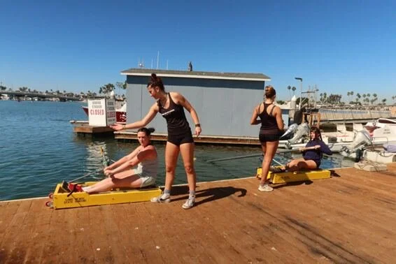 Dock boxes let a recruit feel the stroke before ever leaving the dock.
