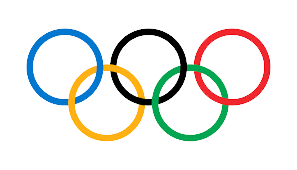 The Olympic rings logo in blue, yellow, black, green, and red on a black background.