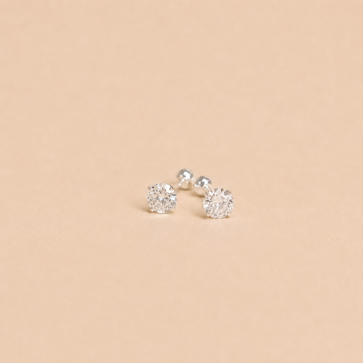 Waterproof gold earrings curated by Vienna at Marda Loop, a Canadian jewelry boutique in Calgary.