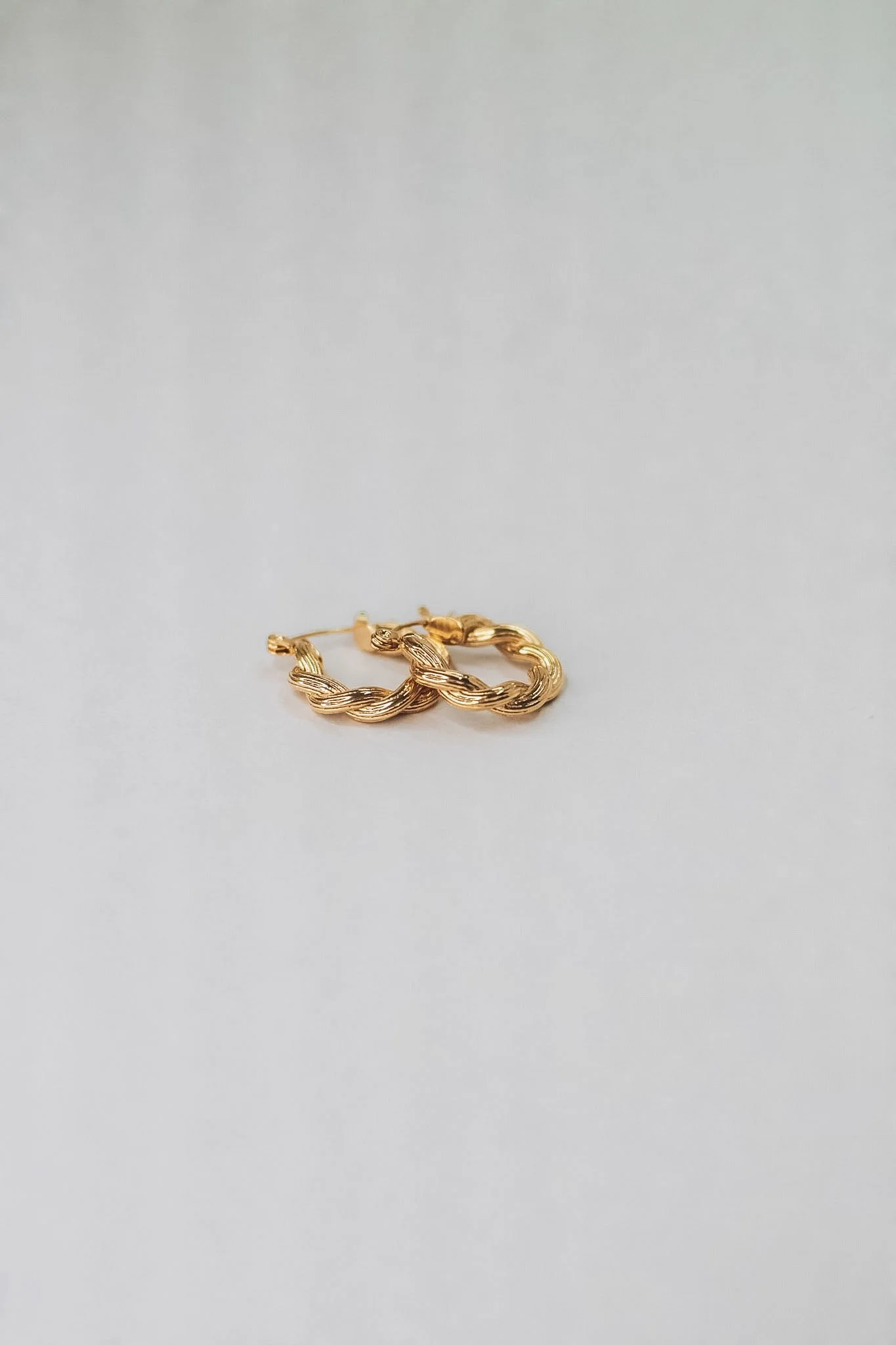 Waterproof gold earrings curated by Vienna Studio, a Canadian jewelry boutique in Calgary.