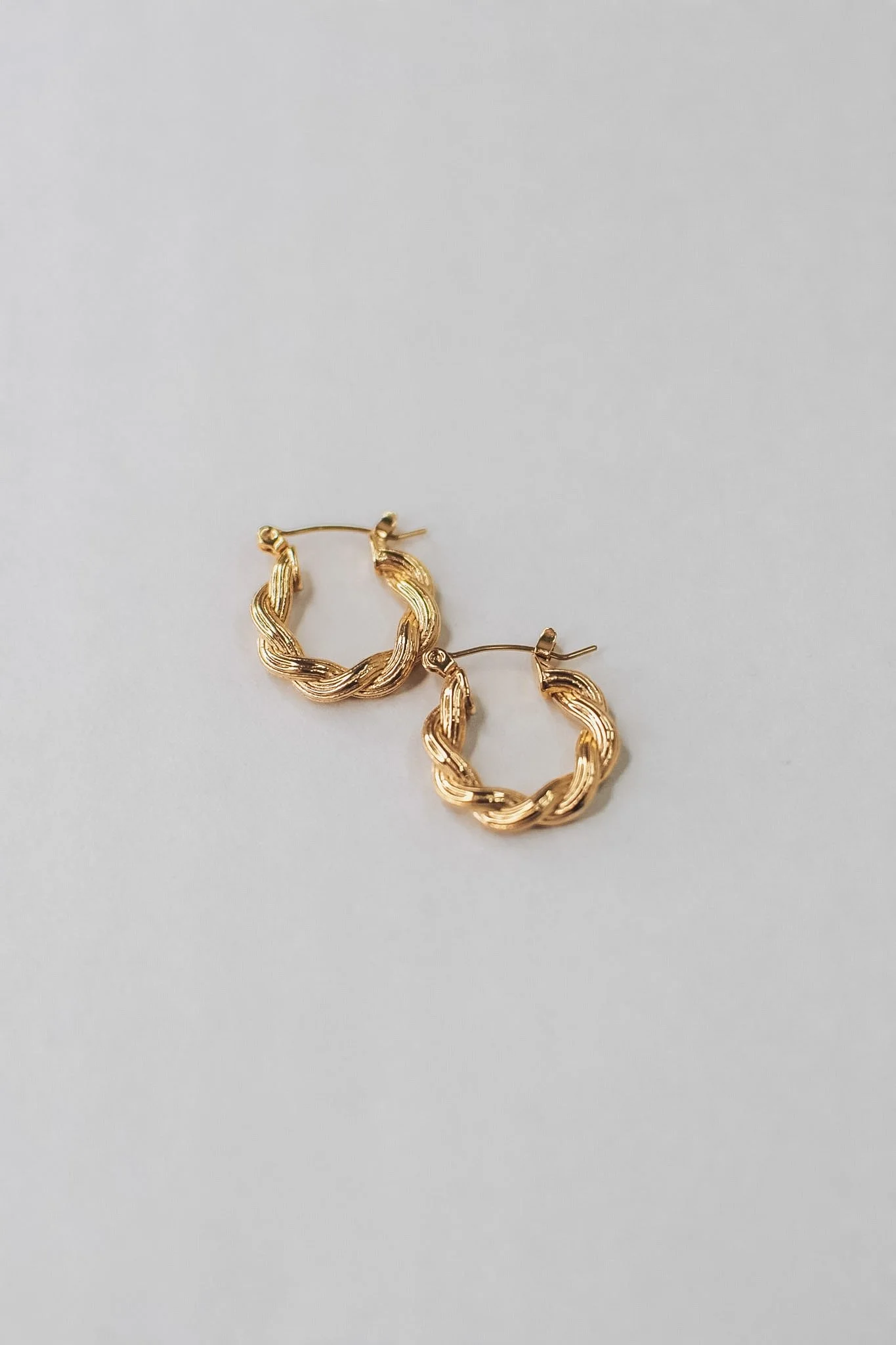 Waterproof gold earrings curated by Vienna Studio, a Canadian jewelry boutique in Calgary.