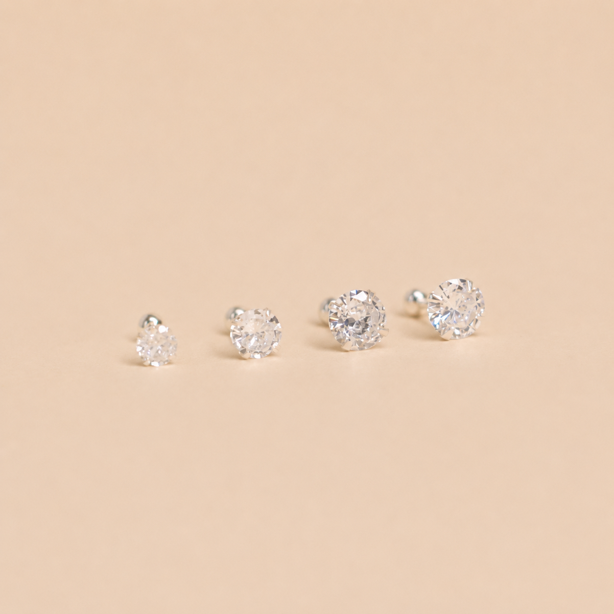 Waterproof gold earrings curated by Vienna at Marda Loop, a Canadian jewelry boutique in Calgary.