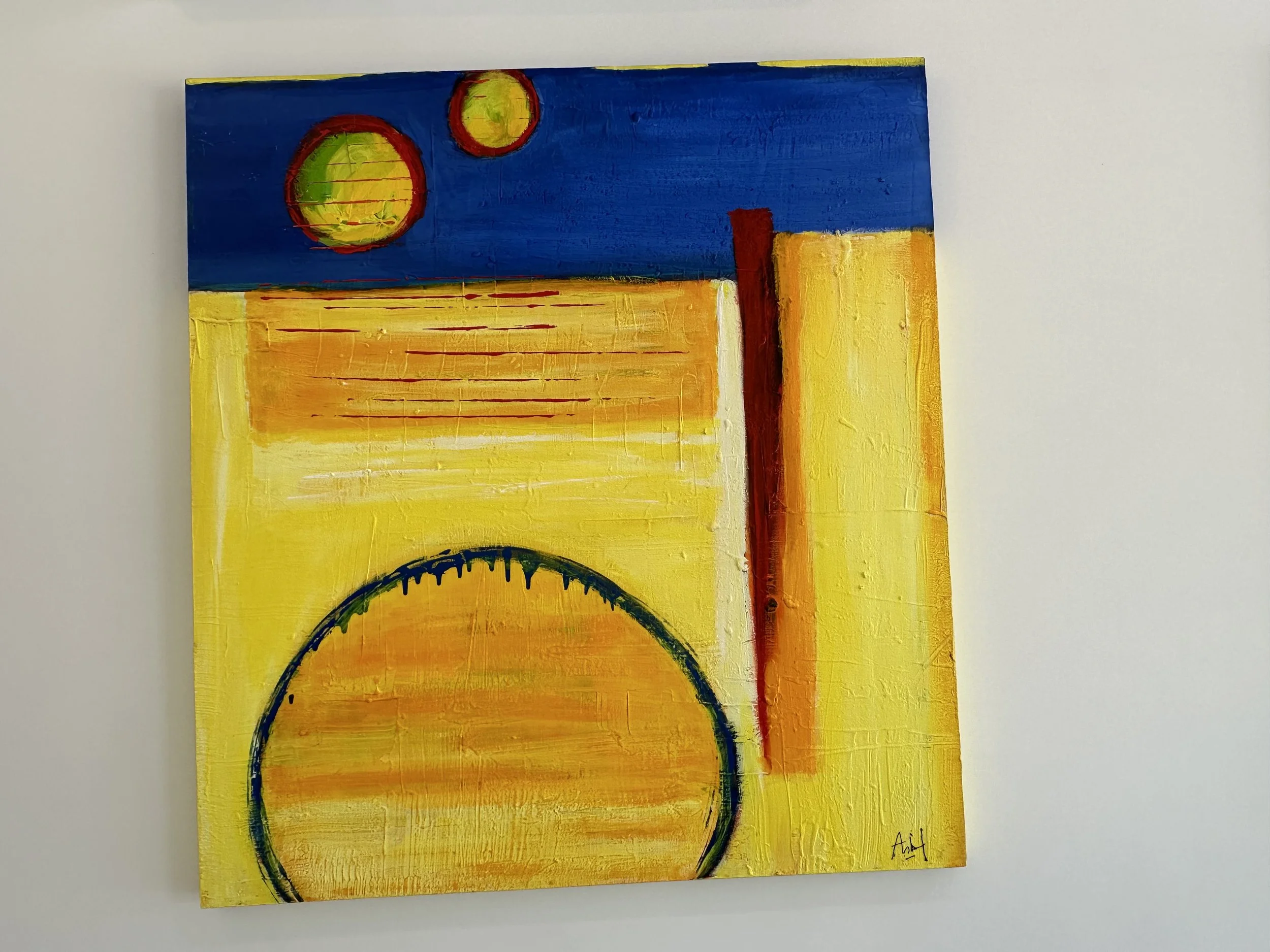 Abstract painting featuring a large yellow arc, a red vertical line, and two green and yellow circles in the blue sky background.