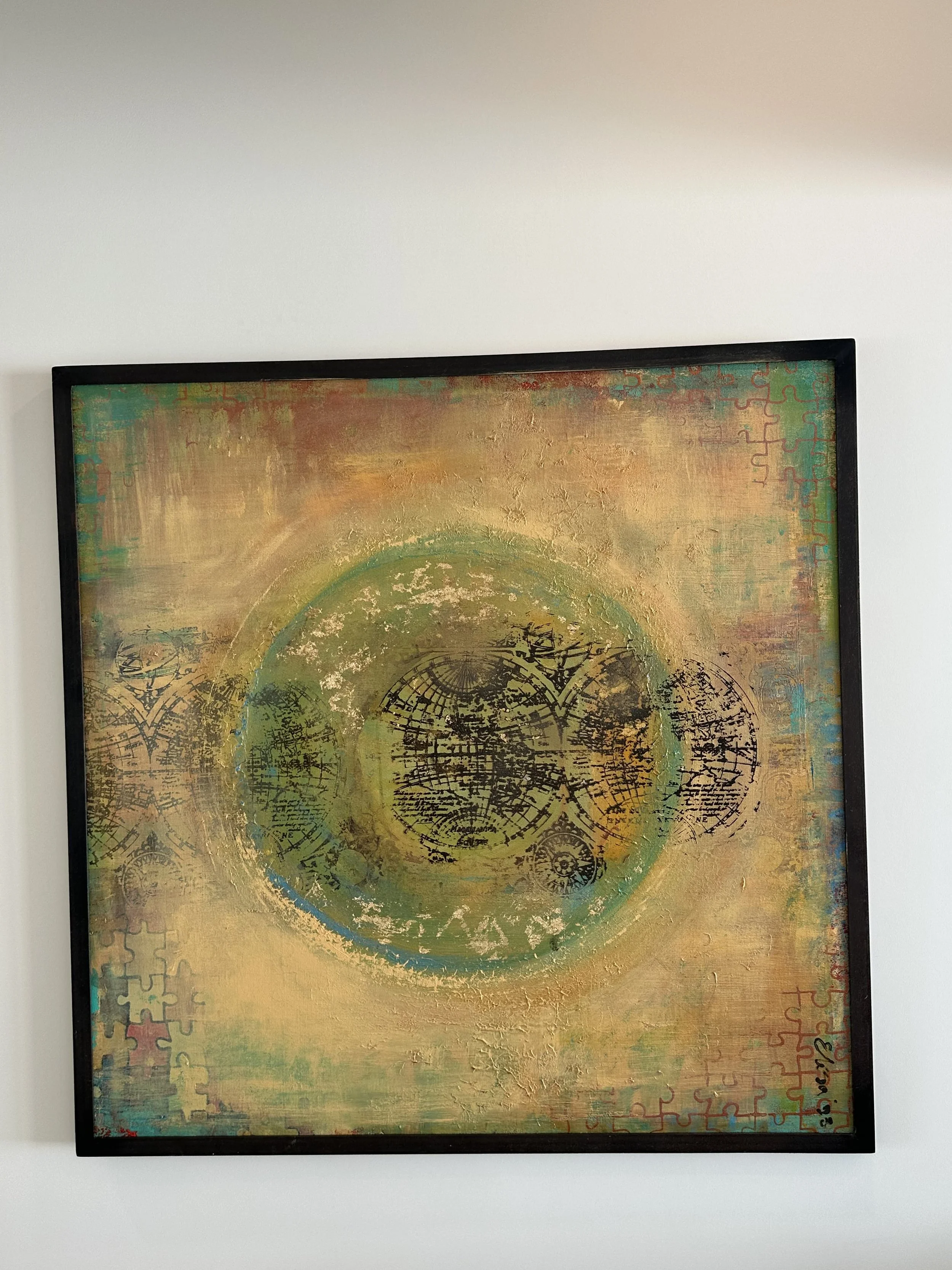 Abstract painting with a circular design and puzzle piece patterns on a textured, multicolored background.