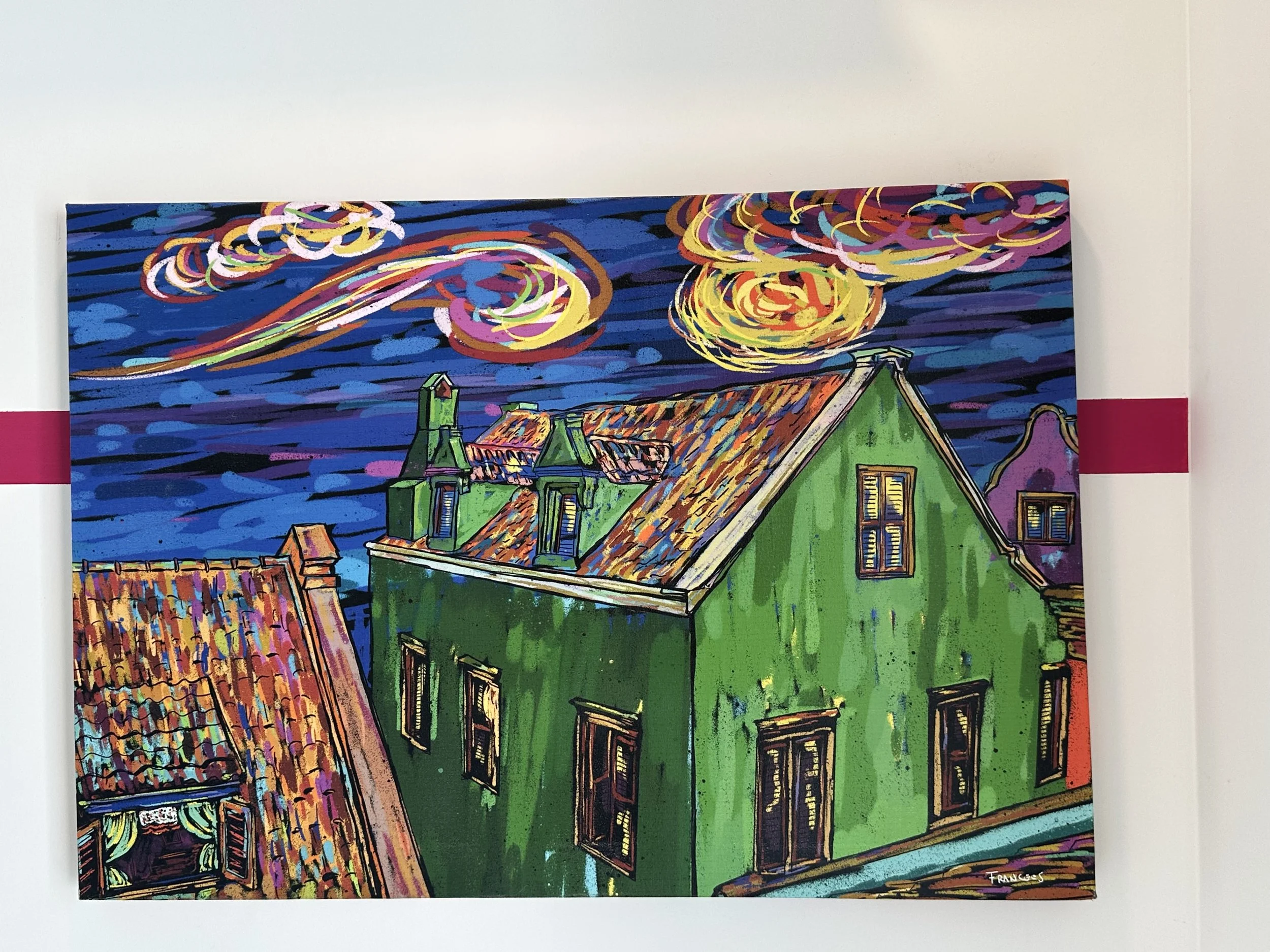 Colorful painting of rooftops and houses under a swirling night sky, inspired by Vincent van Gogh's starry night.