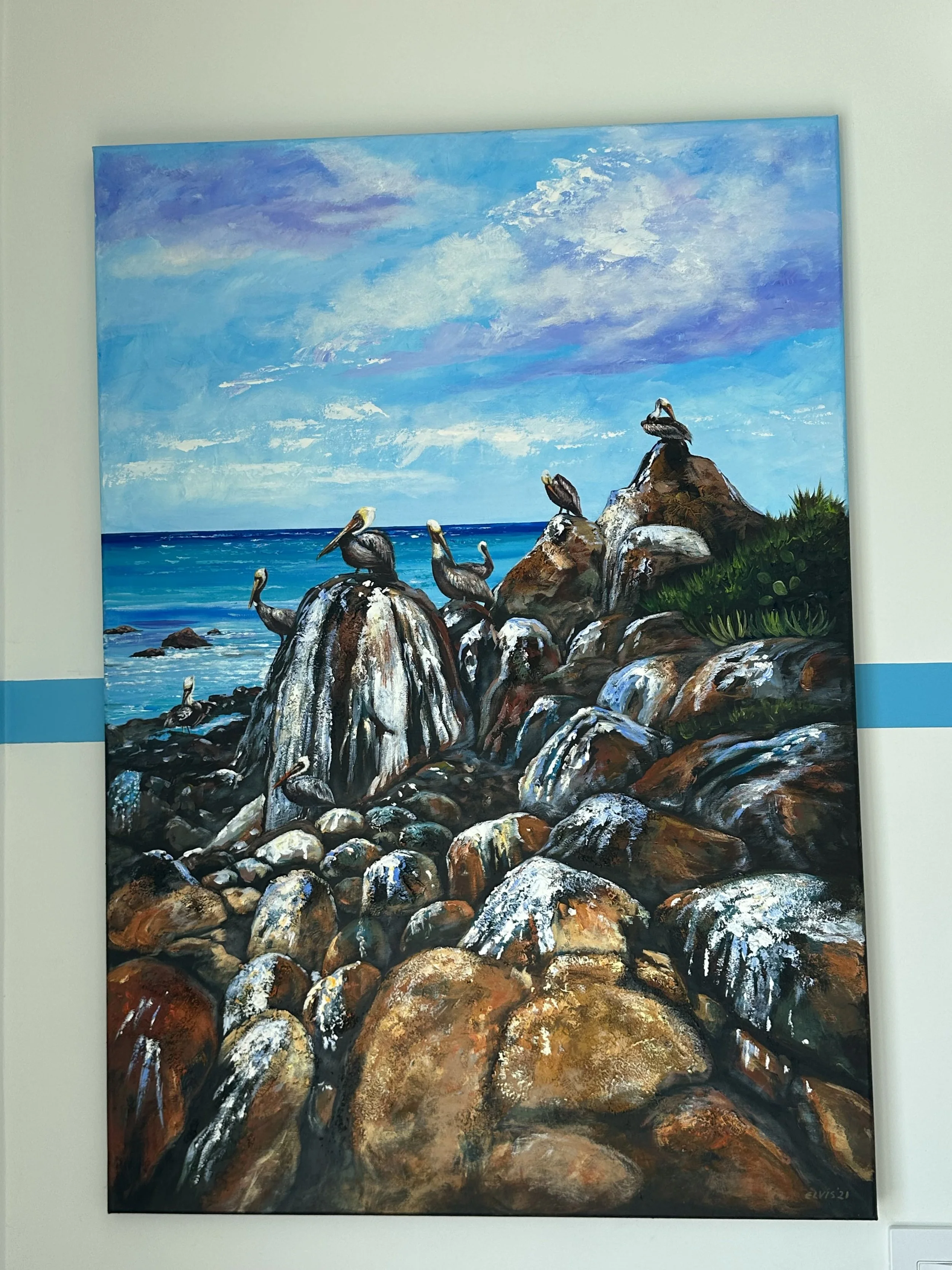 A painting of a rocky shoreline featuring several seabirds perched on rocks, with the ocean and a partly cloudy sky in the background.