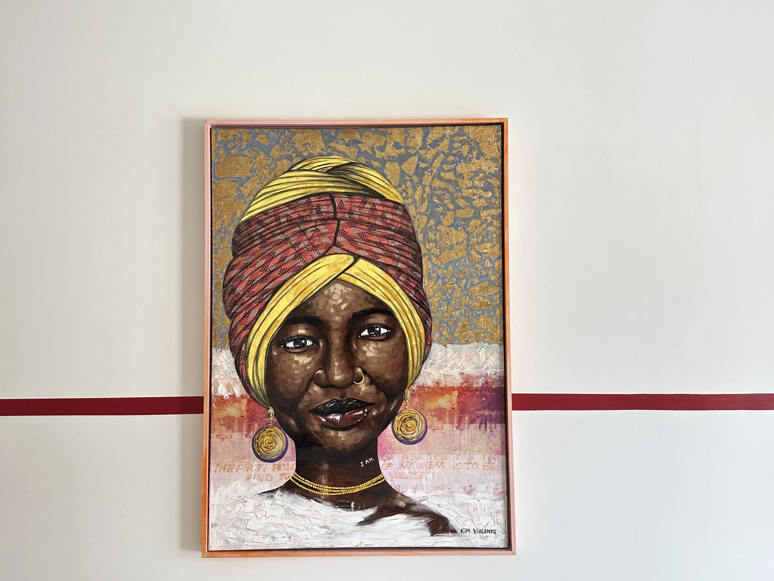 Colorful portrait of a woman wearing a yellow and red headwrap with large earrings, against a textured background with gold accents.