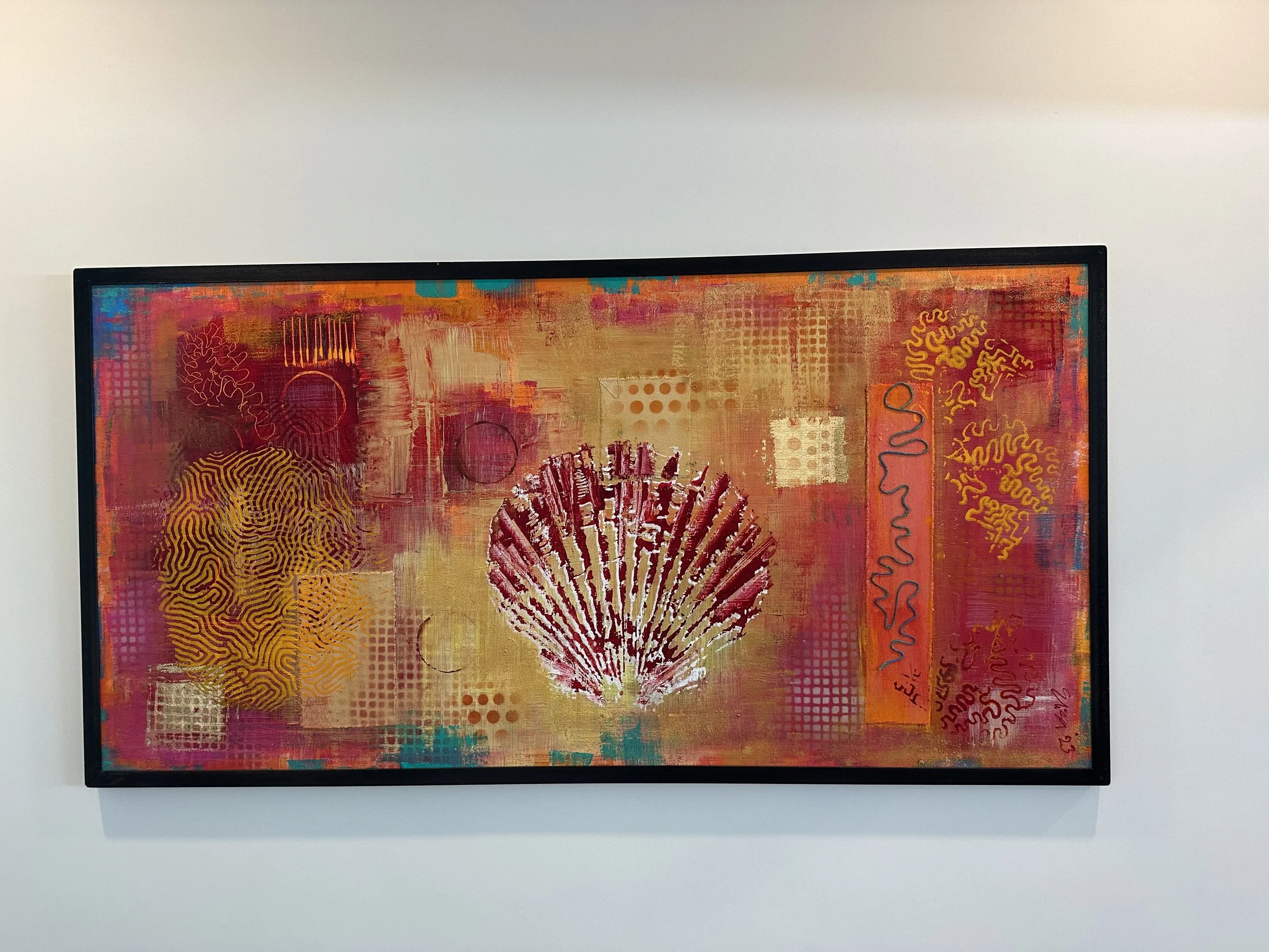 Abstract artwork featuring a large shell and various geometric and squiggly patterns in shades of red, orange, yellow, and purple.