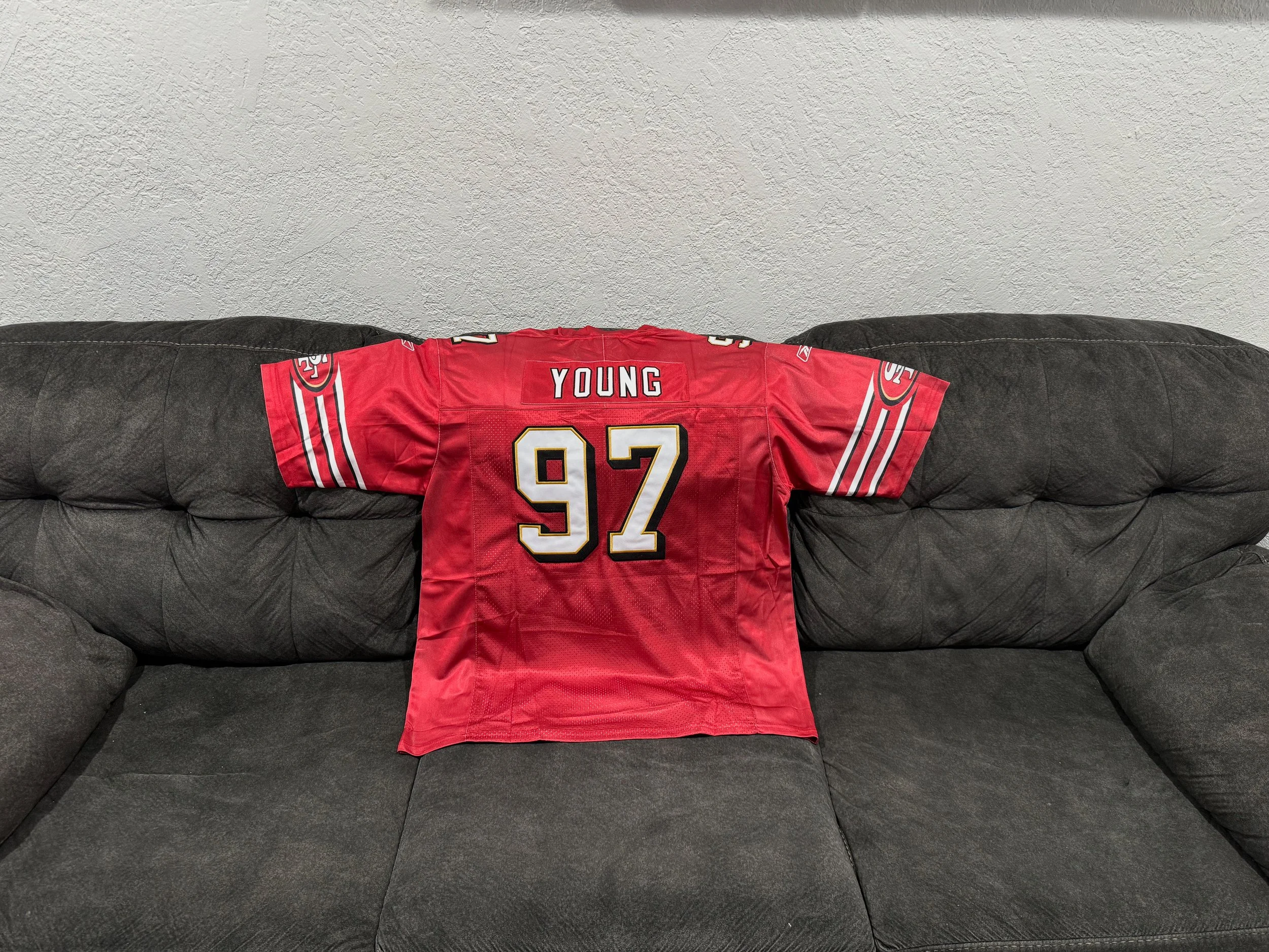 Bryant Young 49ers late 1990's-early 2000's jersey

Men sizes only!