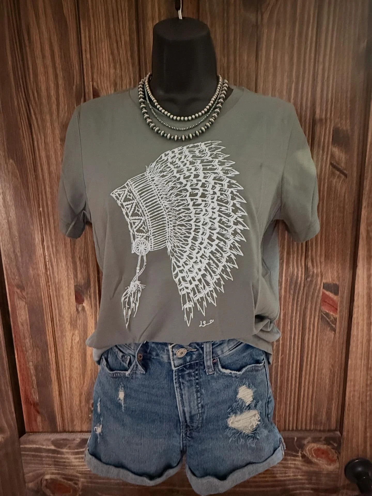 Indian headdress design:

Printed on blue grey Women&rsquo;s Bella canvas

Sizes: S-XL
$25

2X &amp; 3X
$29

Add $6 for shipping or you can pick up in Ramona, OK
