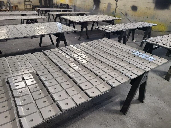 grey steel pieces coated and painted