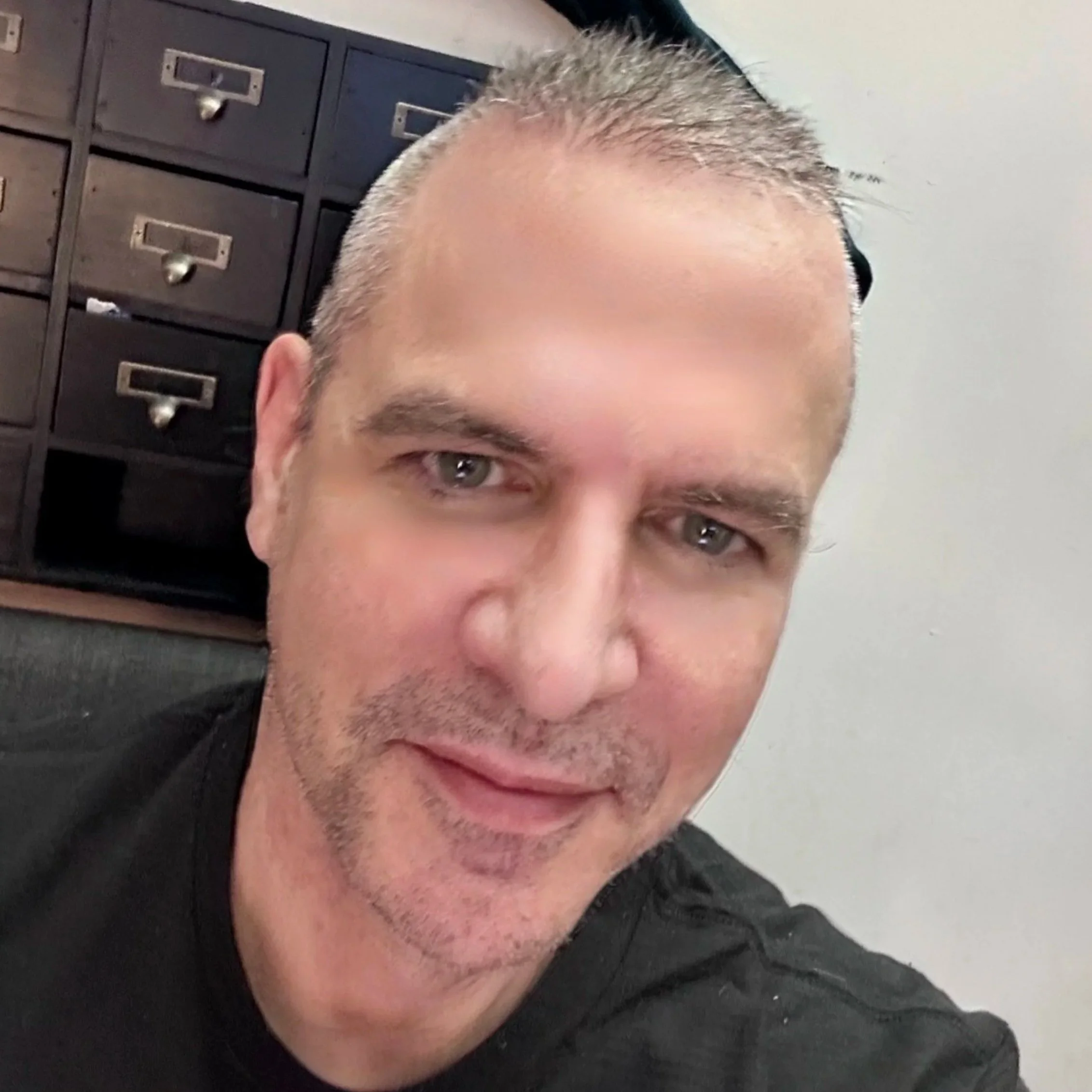 Close up handsome man smiling self confidently with an assuring smile.