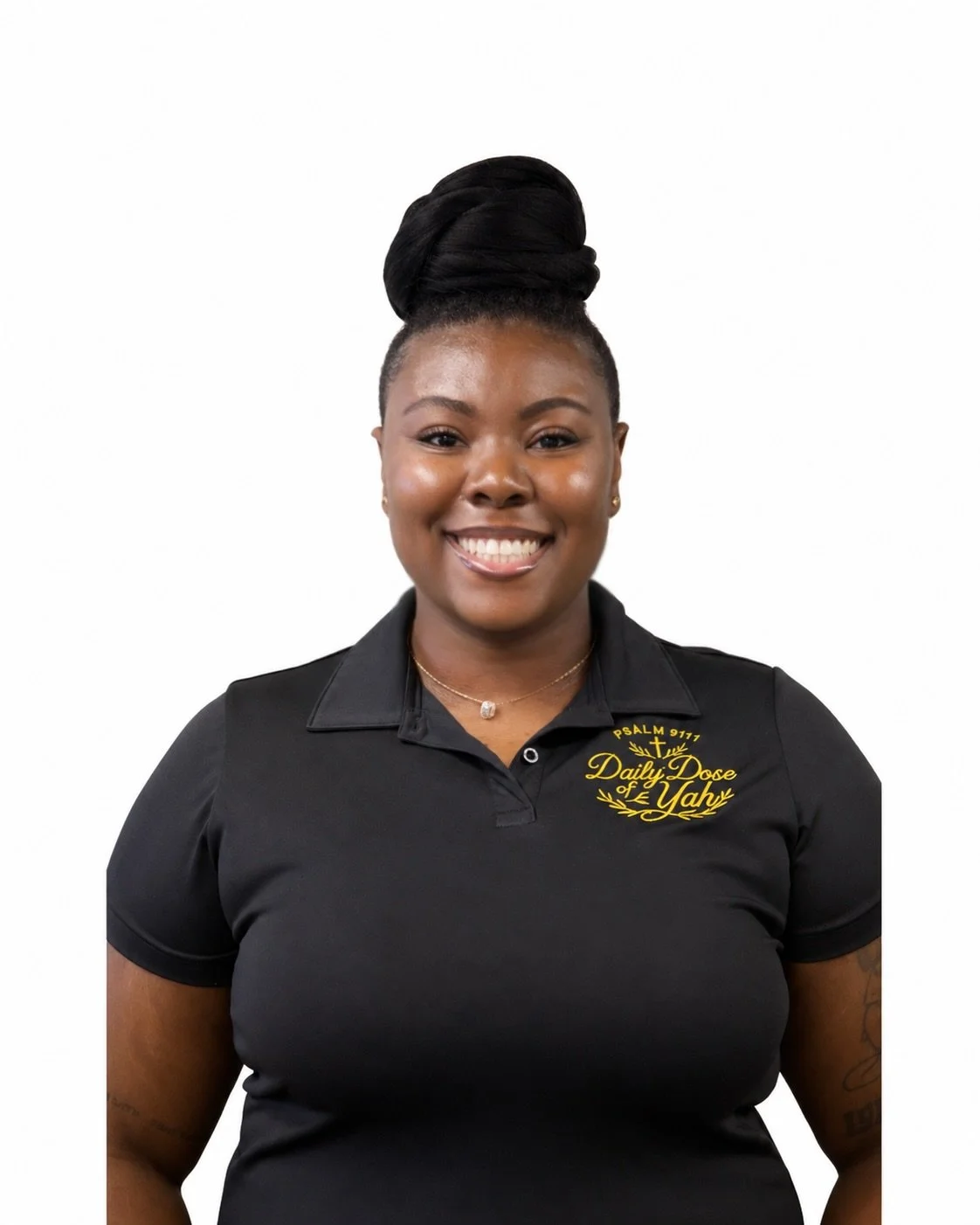 Ceo smiling confidently wearing  "Daily Dose of Yah" and "Psalm 91:17."