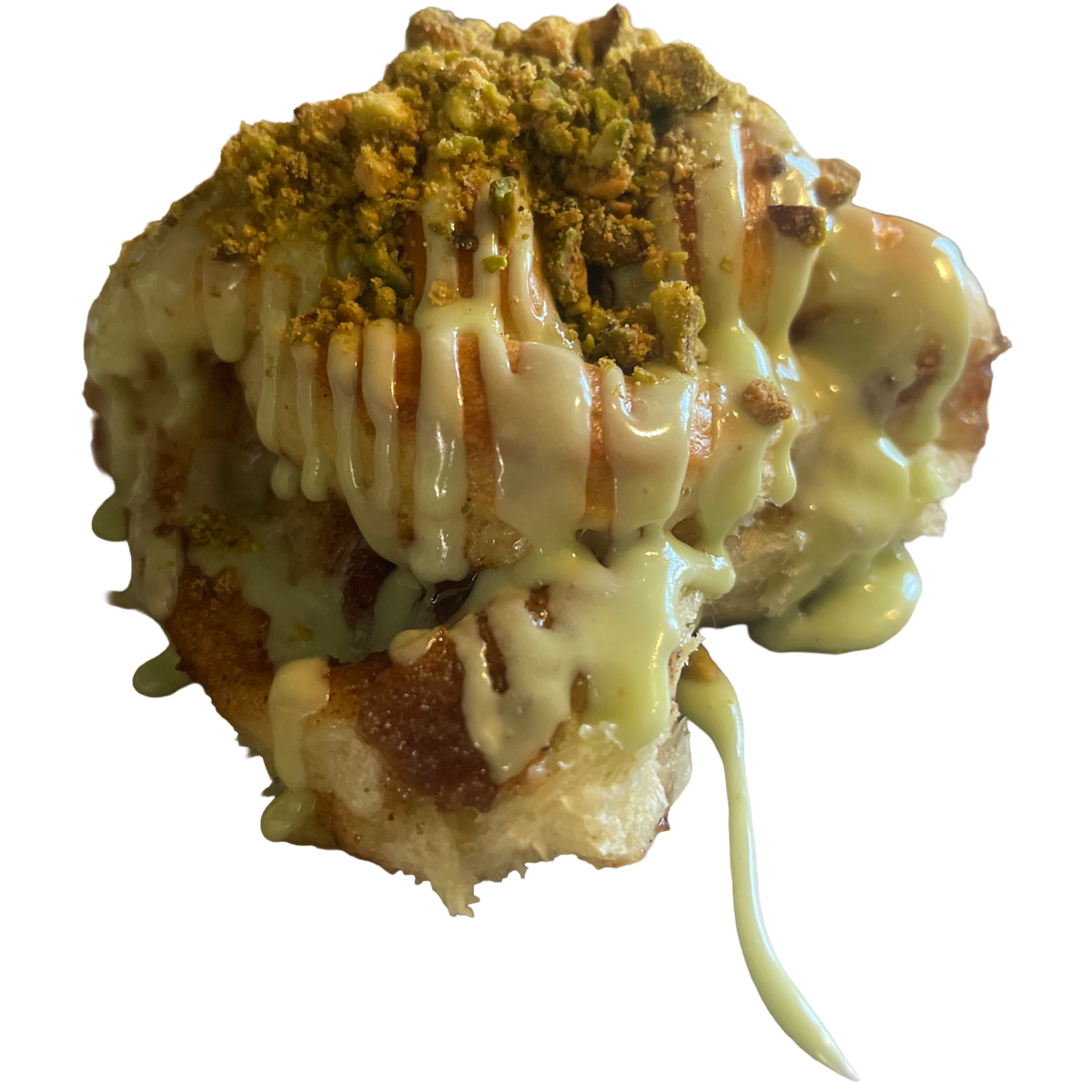 Soft braided cinnamon pastry with pistachios and a pistachio glaze.