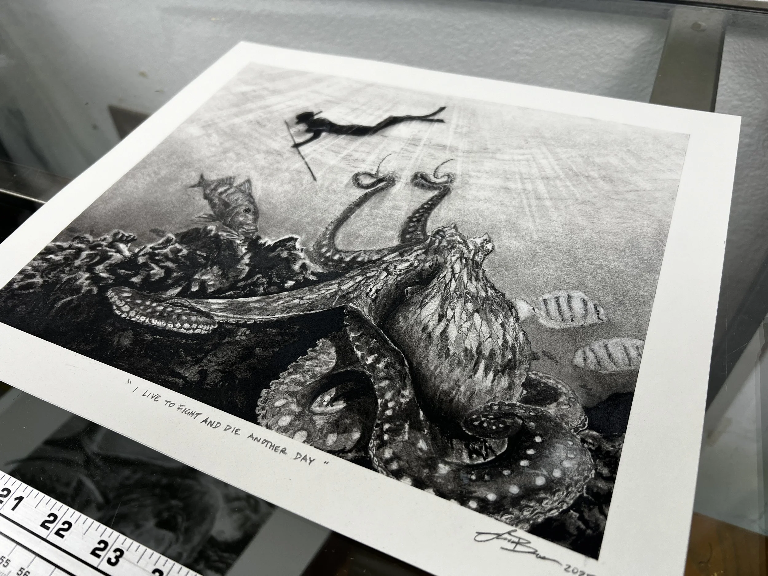 A charcoal drawing of an octopus with a clock on its head, underwater scene with fish, and the quote 'I live to fight and die another day' at the bottom by artist Jason Bero.