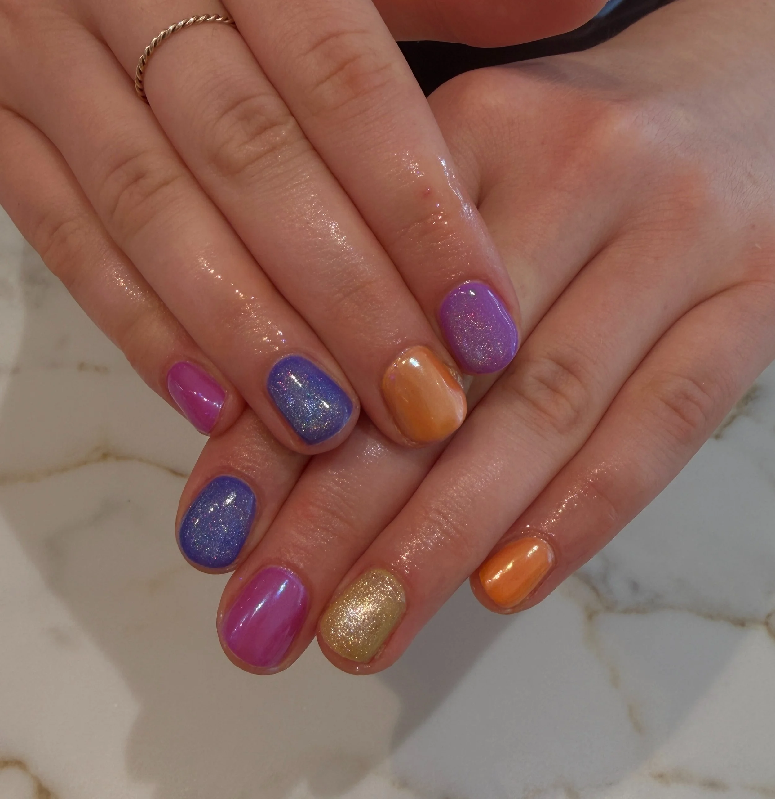A little galaxy at your fingertips 🌙✨
.
.
What to ask for?
Service: Signature Mani 
Colour: Cateye , Shimmer , Gold
Shape: Round
Length: Short

#biab thegelbottlebiab #cateyenails #meltnailbar #brontenailsalon