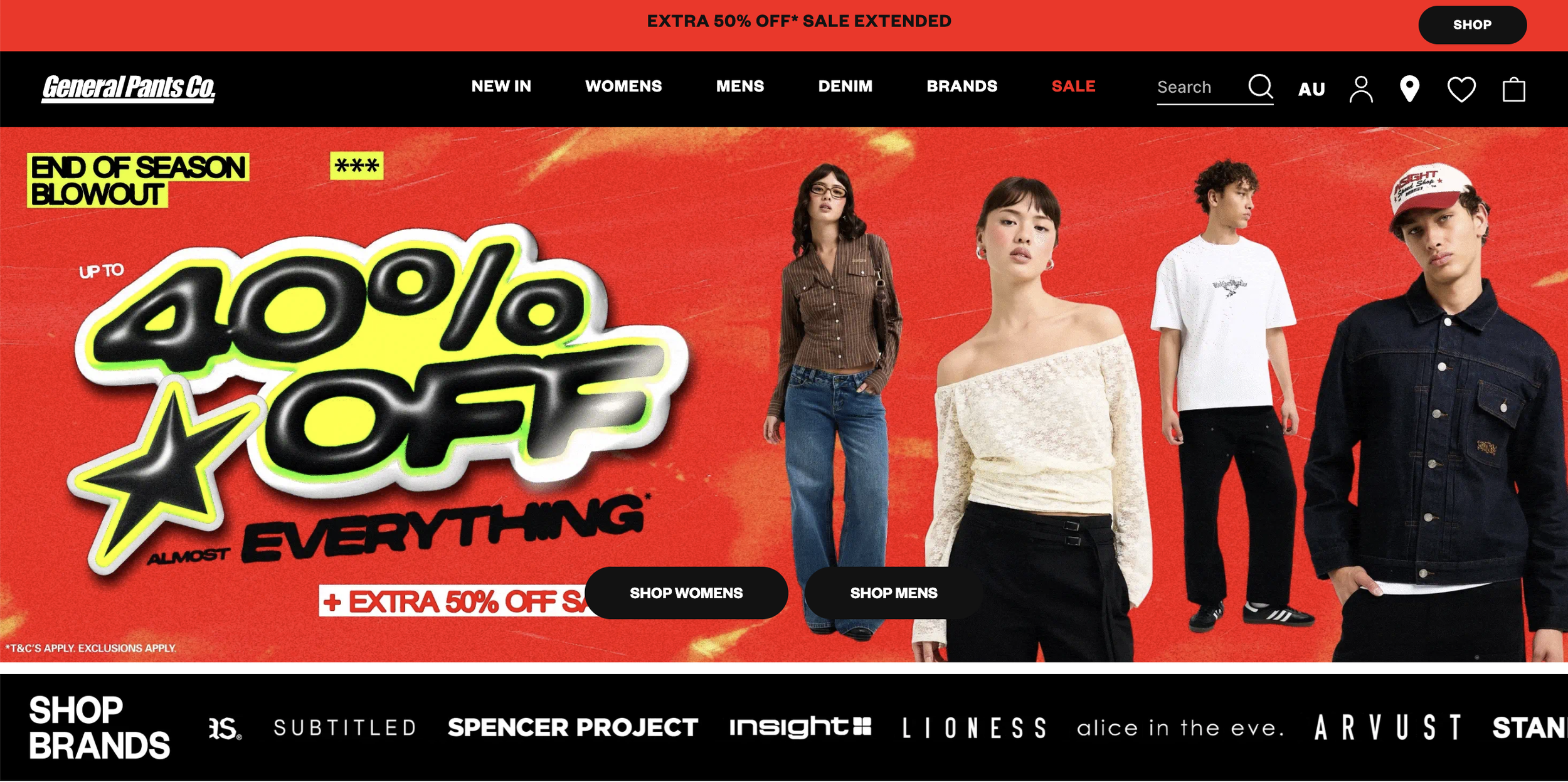 Advertisement for a sale at General Pants Co., featuring models wearing casual clothing. The background is red with yellow highlight text announcing up to 40% off, with additional discounts. The top bar includes navigation links and icons for search, user account, location, wishlist, and shopping cart.