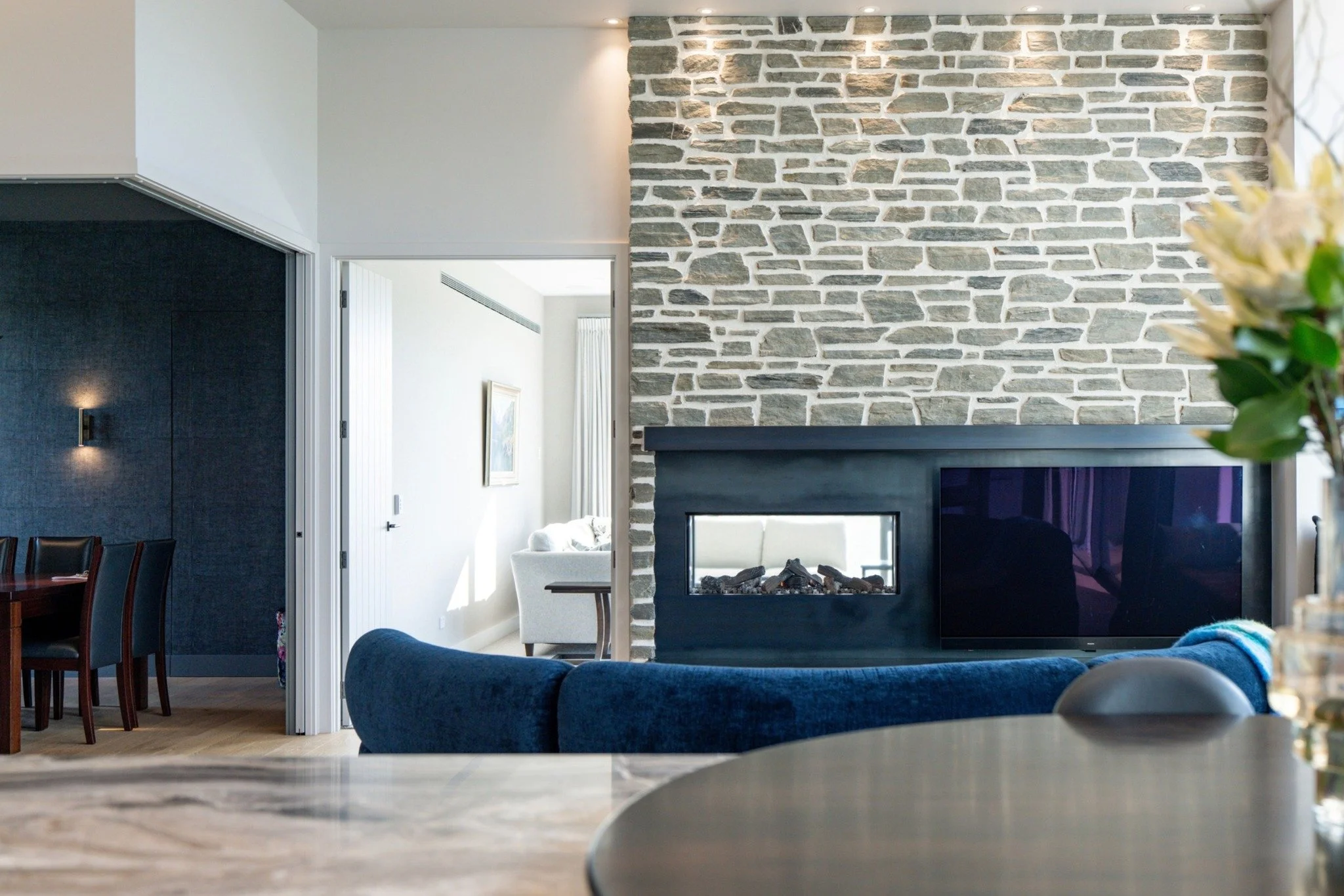 Spaces that adapt to how you live.

Entertaining is an important part of how our clients use this home, so the dining room was designed to feel intimate when needed, while remaining connected to the wider living spaces when opened up.

Tucked behind 