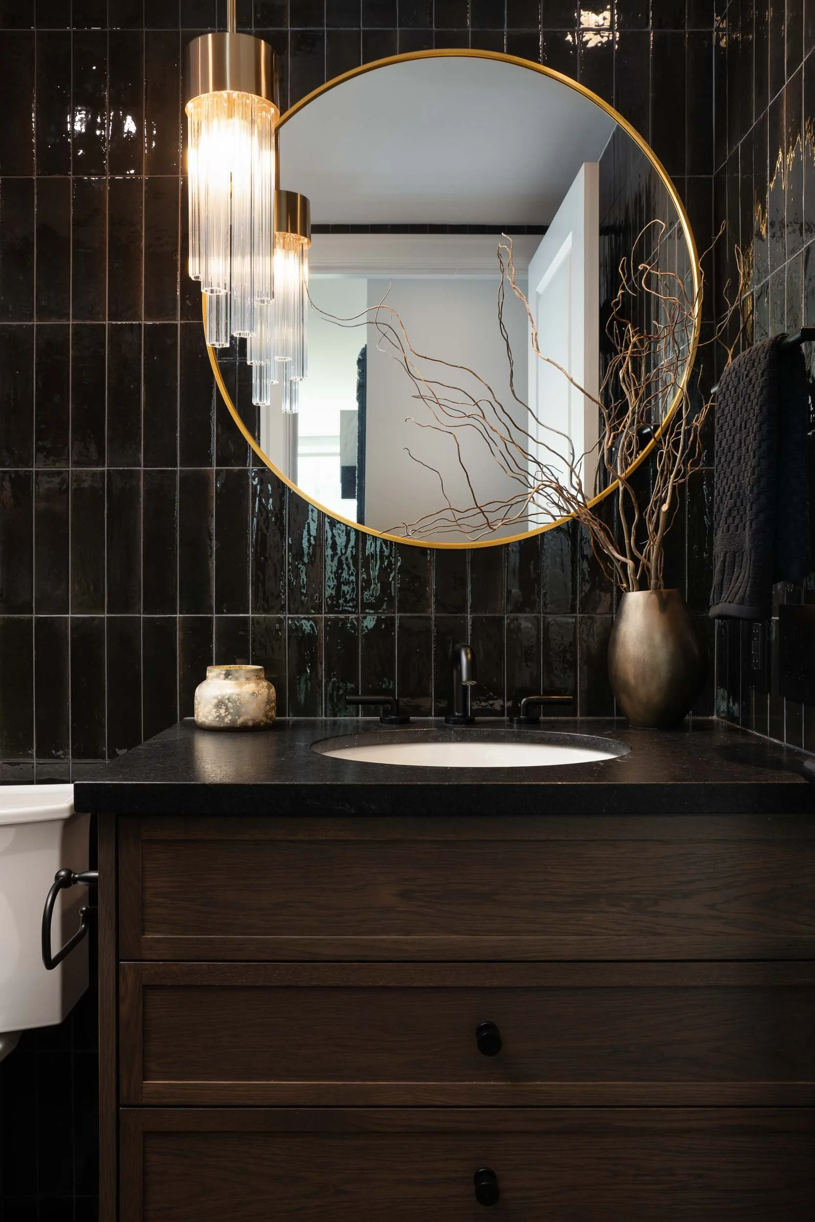 vancouver-captivating-coal-harbour-powder-room-round-gold-mirror.jpg