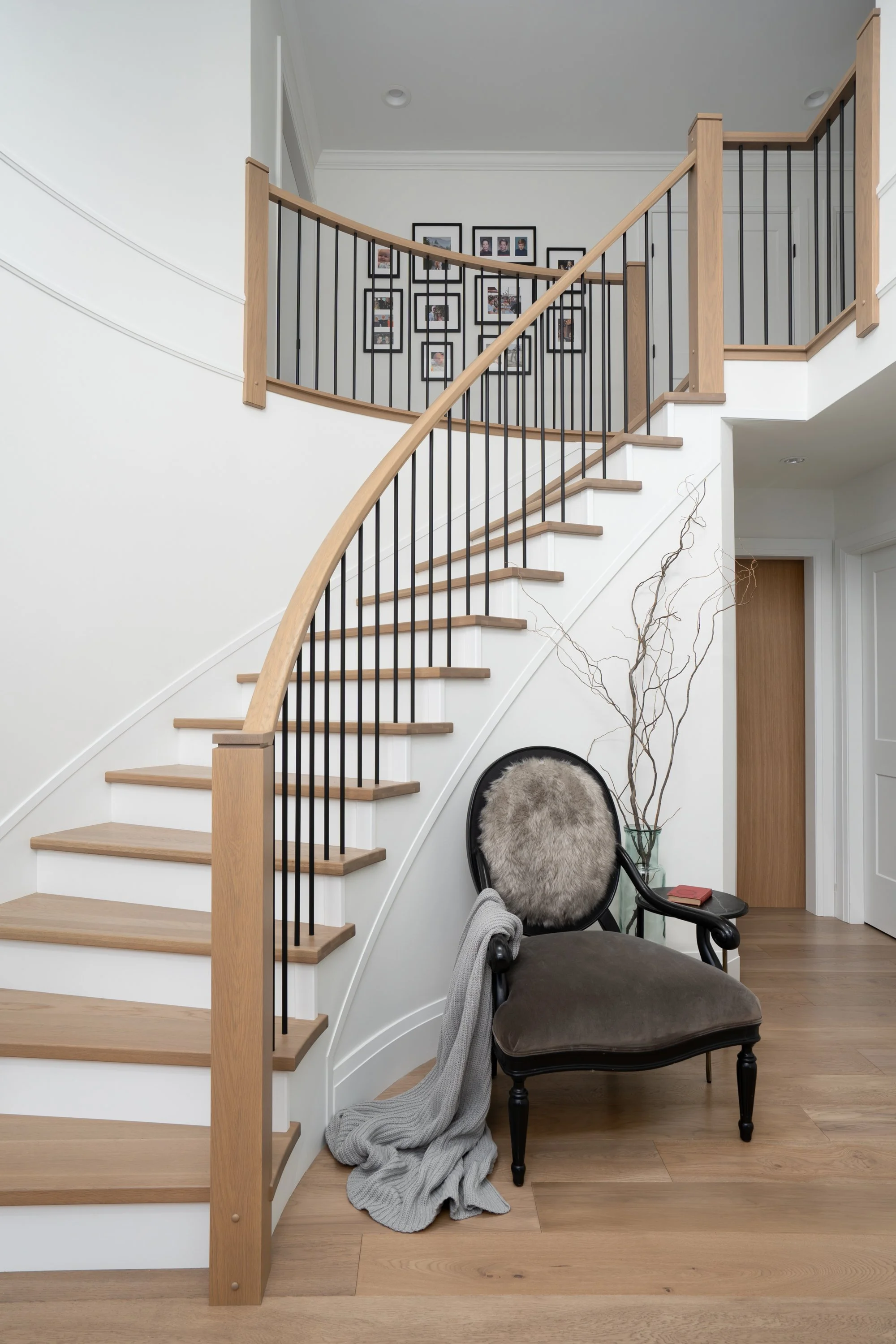 north-vancouver-braemar-residence-foyer-staircase-sitting-chair.jpg
