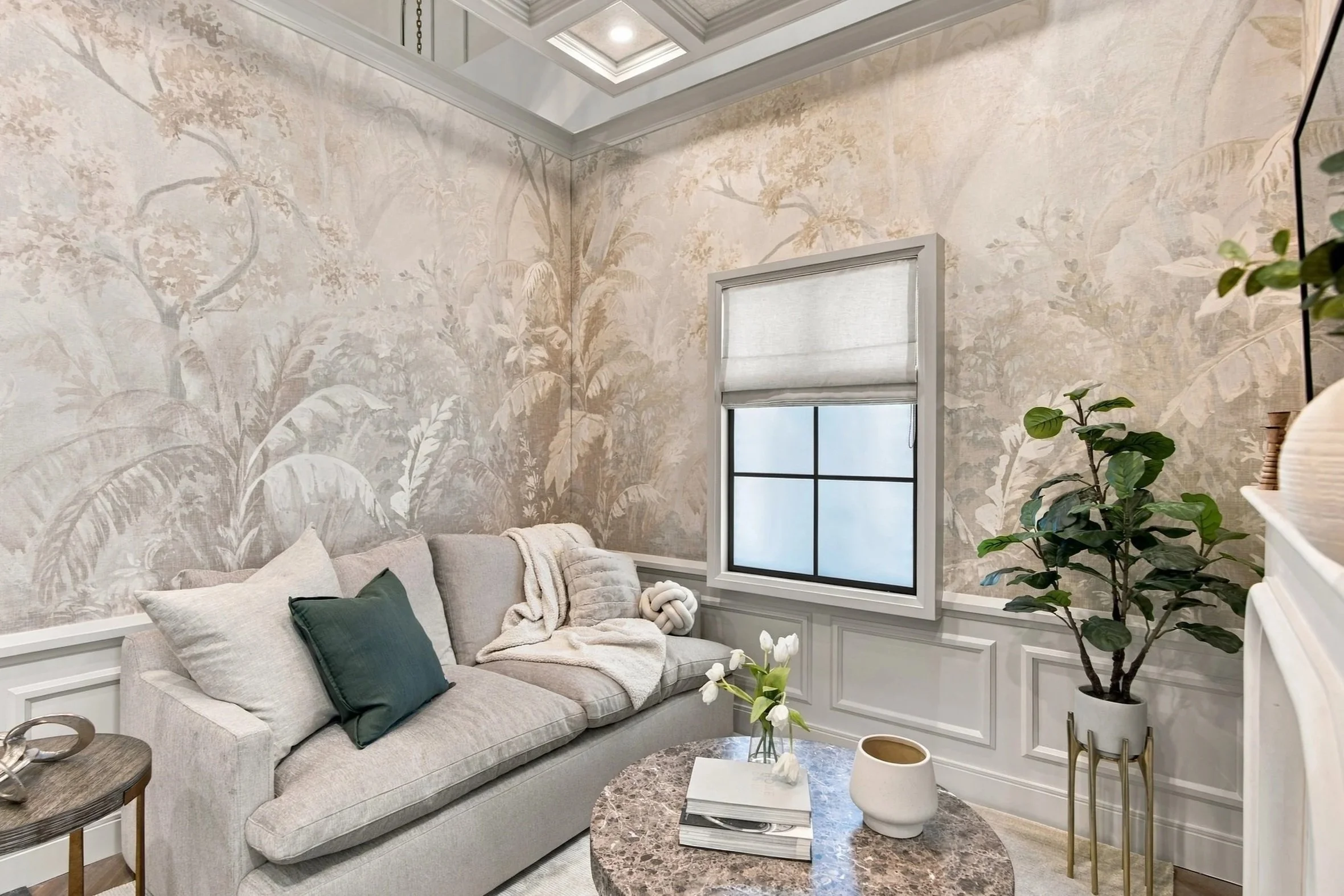 traditional living room with beige sofa