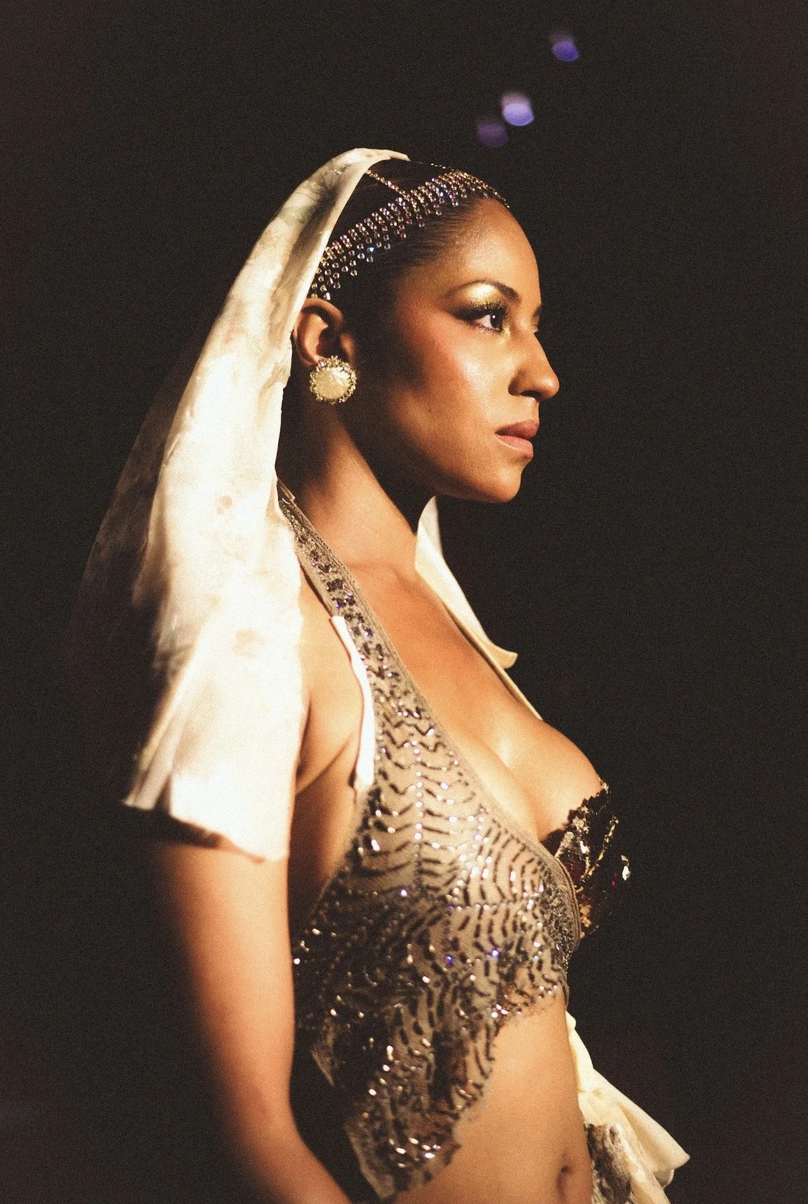 Coley walking the runway during Art Basel in Miami in a jeweled look, Miami Art Week Fashion Show