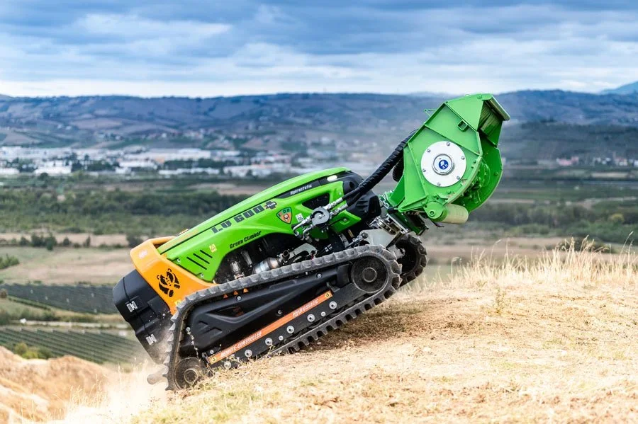 Remote-controlled slope mower clearing roadside vegetation for council fire mitigation in Great Southern WA