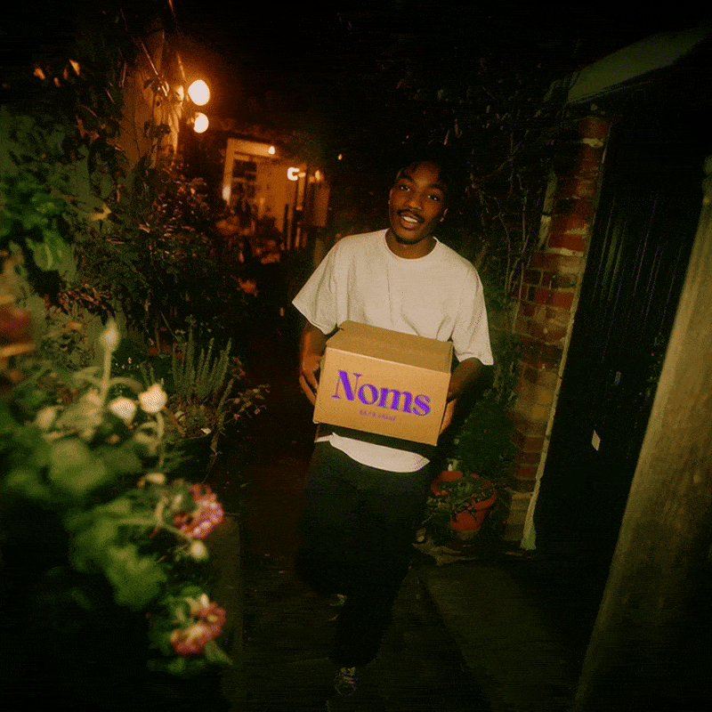 social_aera2016_walking_towards_the_camera_holding_the_box_--ar_11_-_22d5e9b6-654d-4ccc-916d-33099b4cdbb0_31-ezgif.com-optimize.gif
