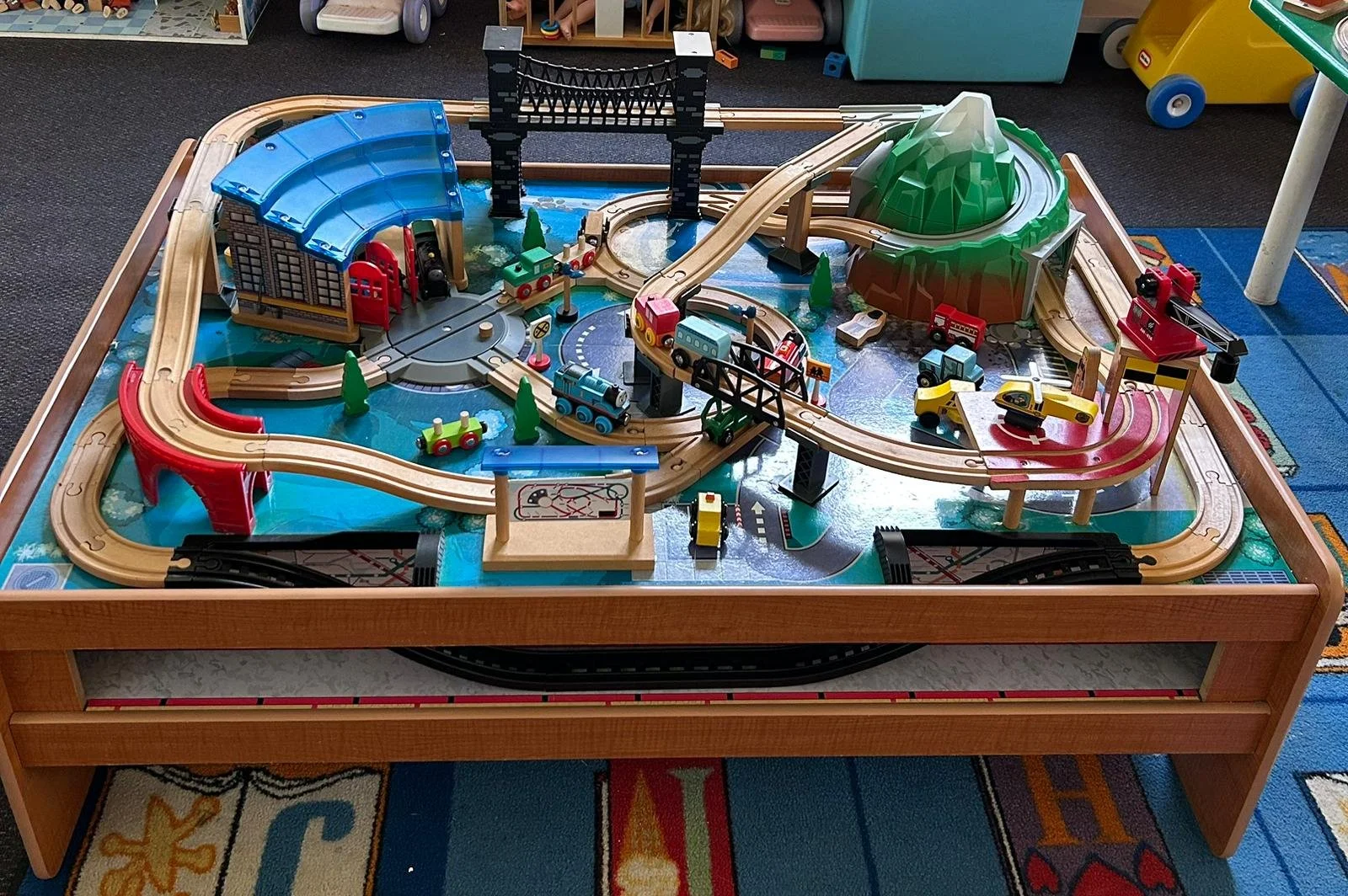 A wonderful train set fixed to table perfect sized for children.