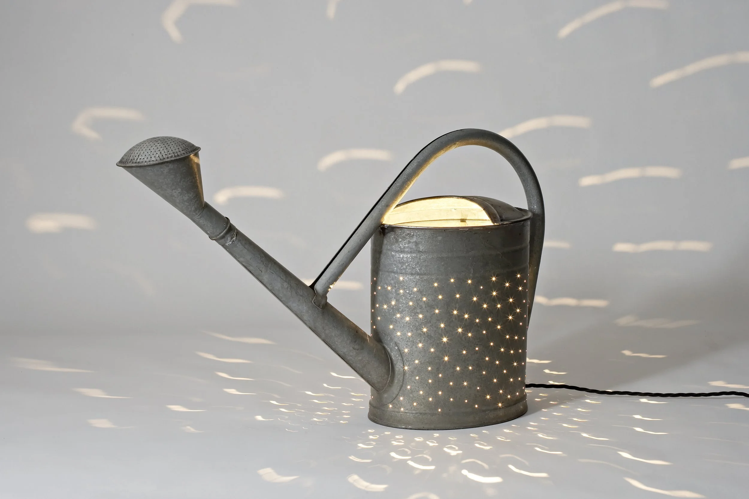 rolfsachs_pouring_light_watering_can_1.jpg