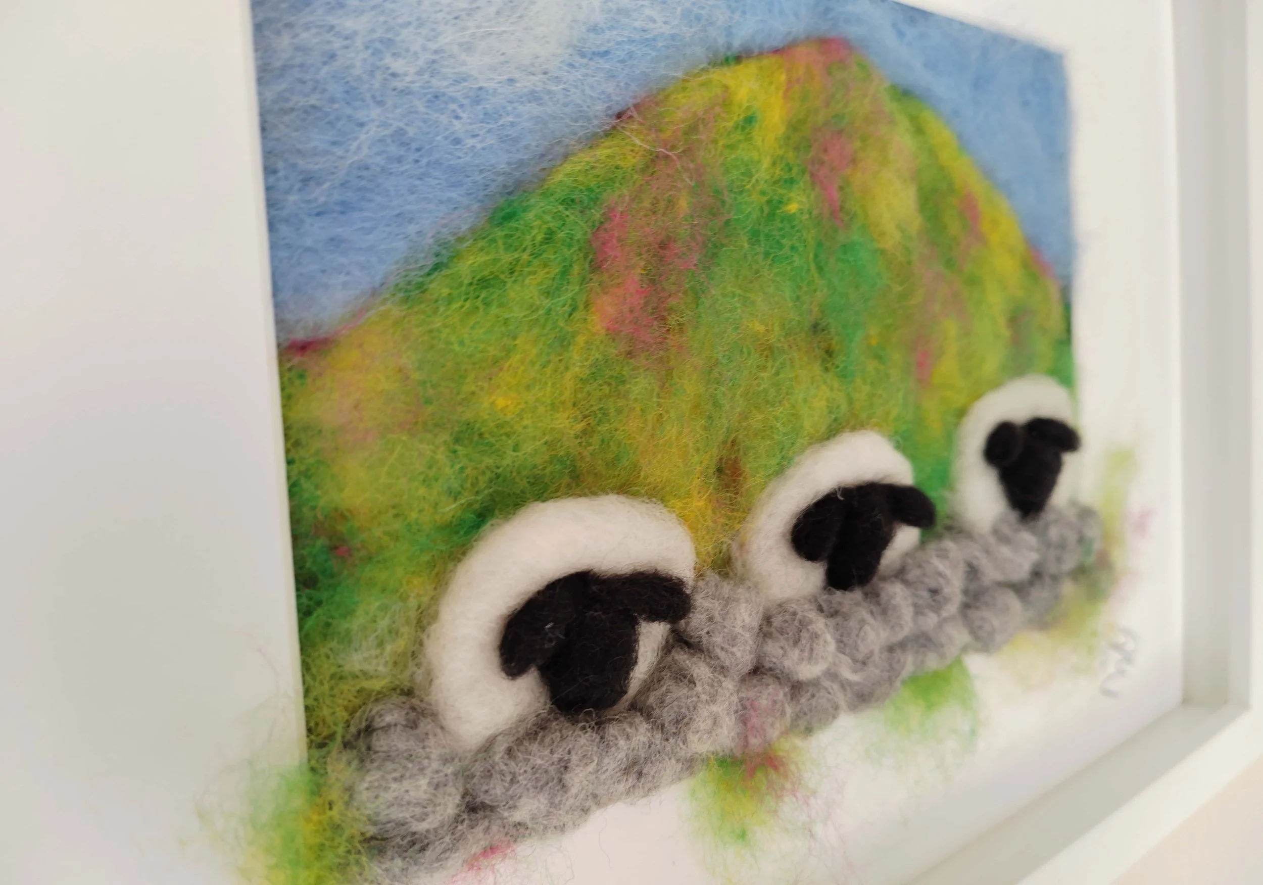 IMG_Three sheep and a wall side profile-2.jpg