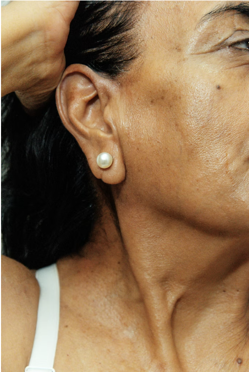 Mature middle eastern woman side profile with defined wrinkles