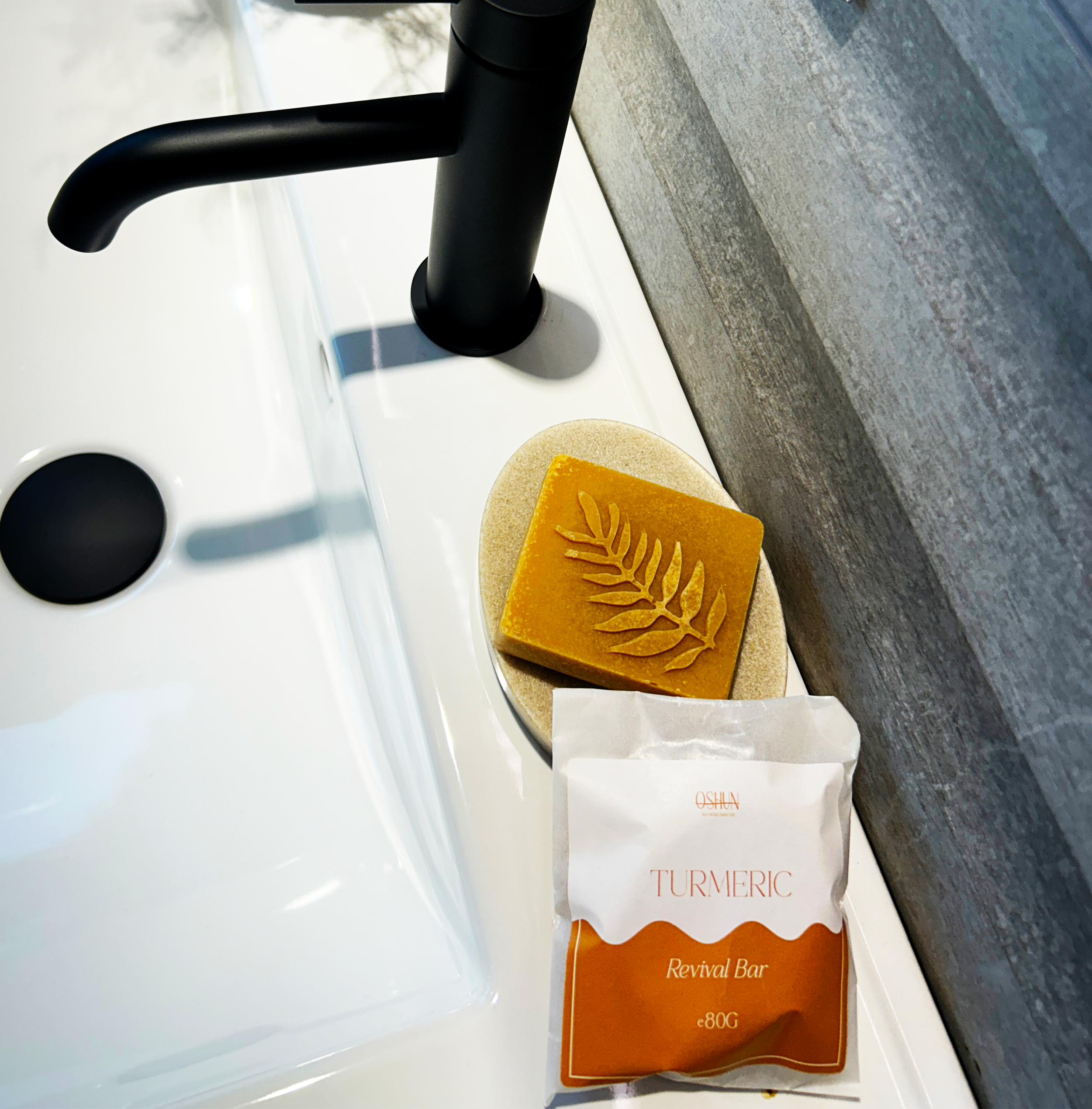 square turmeric revival bar on sink with packaging