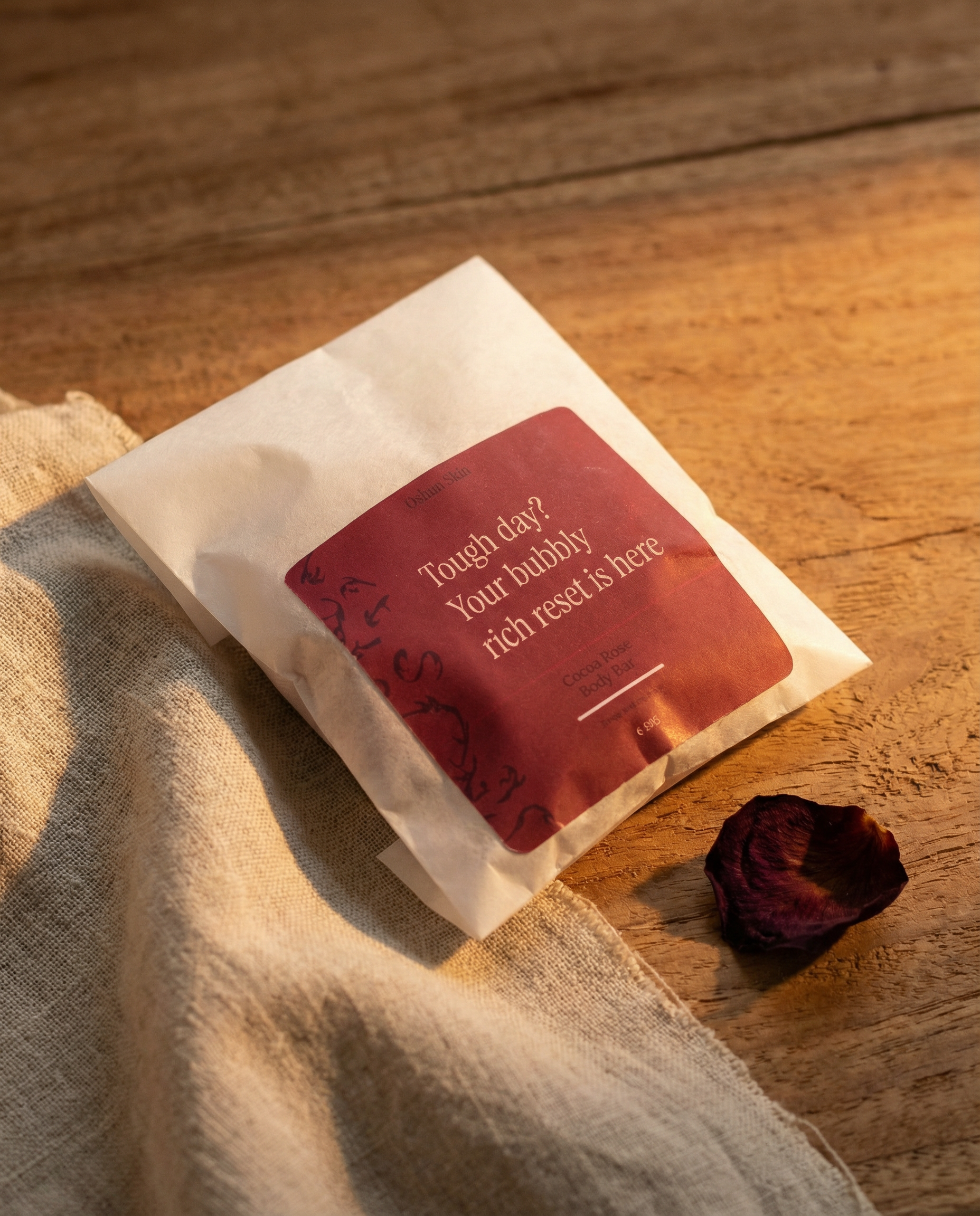 cocoa rose packaging angled with linen and dried rose petal.png