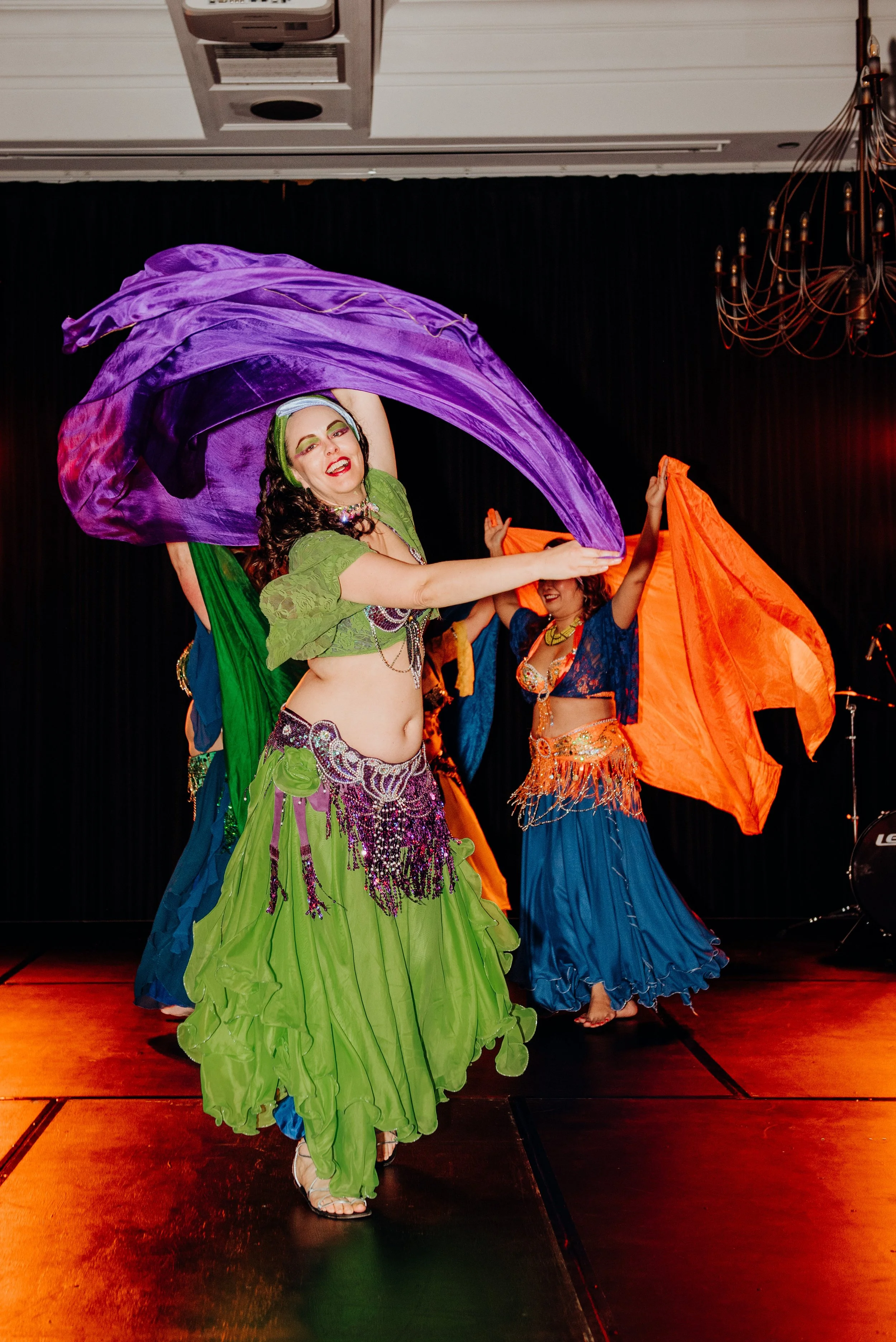 Juniper and the Gems performing a silk veil dance at Limelight 2025.