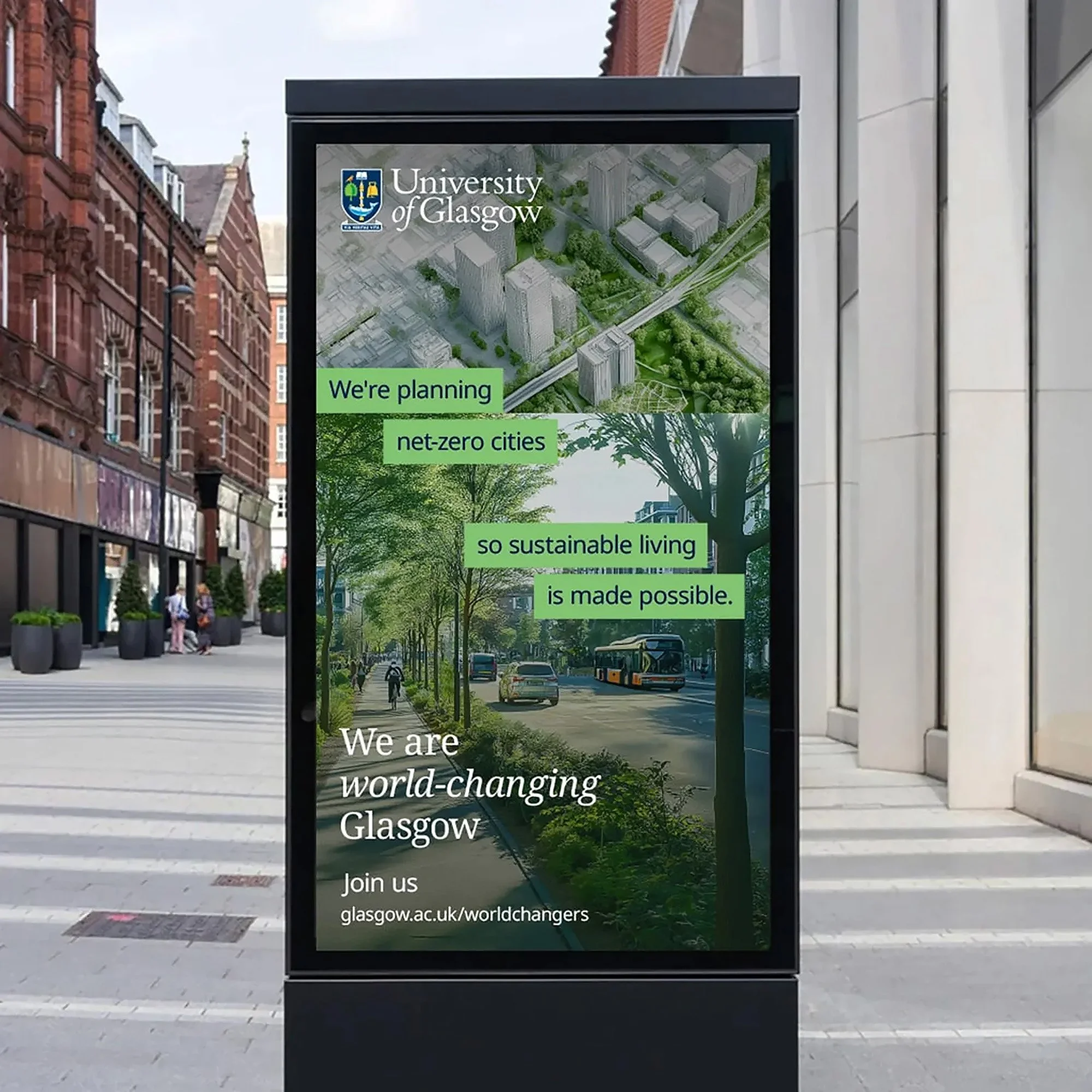 Digital billboard outside University of Glasgow with climate and urban planning message about creating net-zero cities and sustainable living in Glasgow.