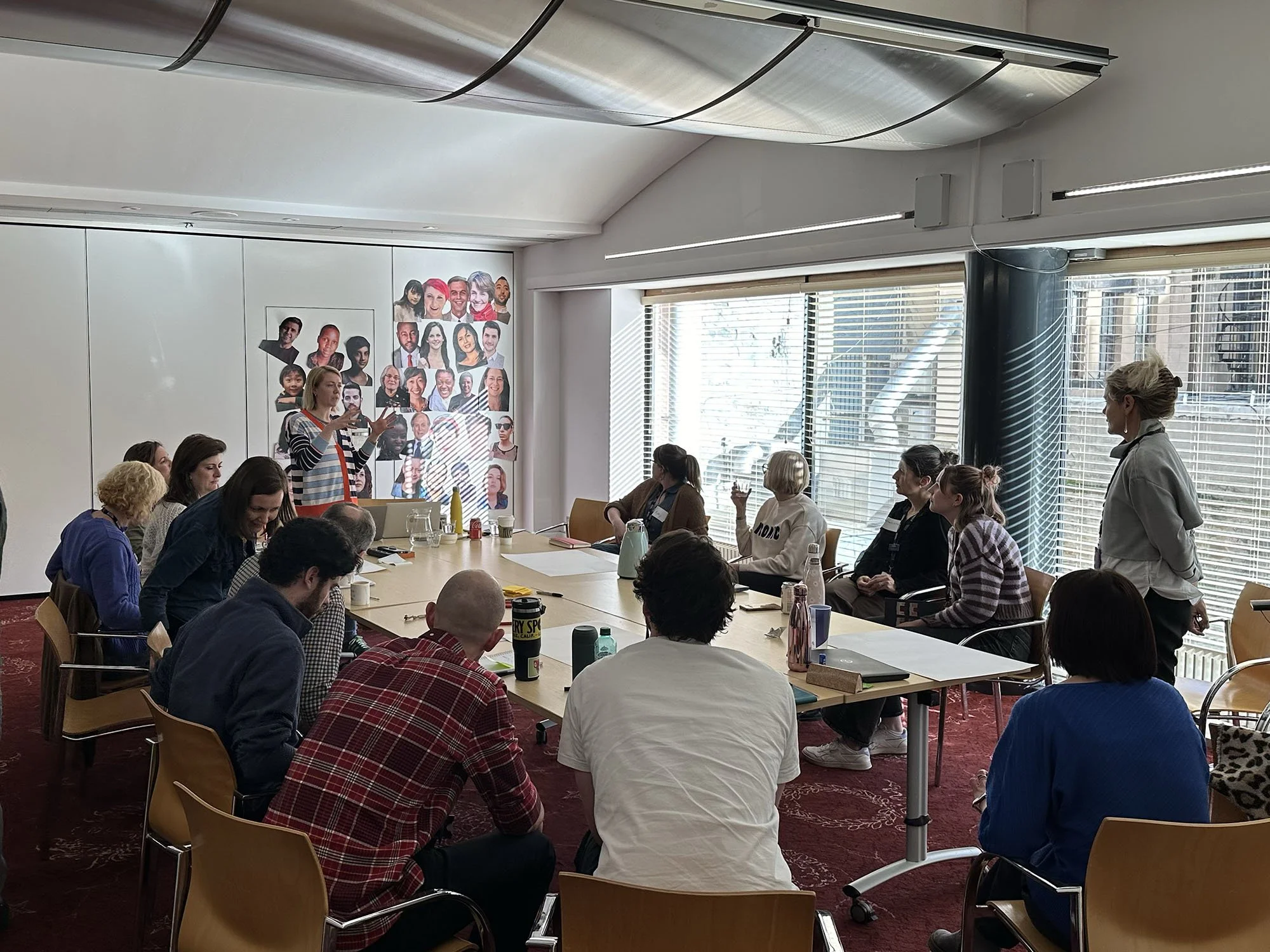 Photo of Emma running a workshop with the Capital Theatre team.