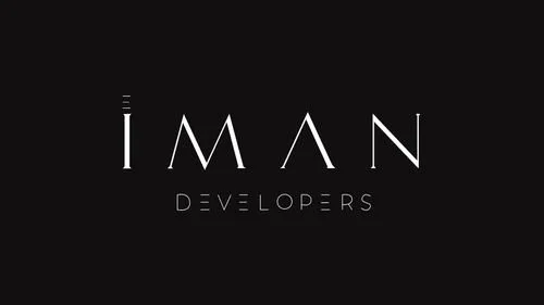 Black background with the white text 'IMAN DEVELOPERS' centered in the image.