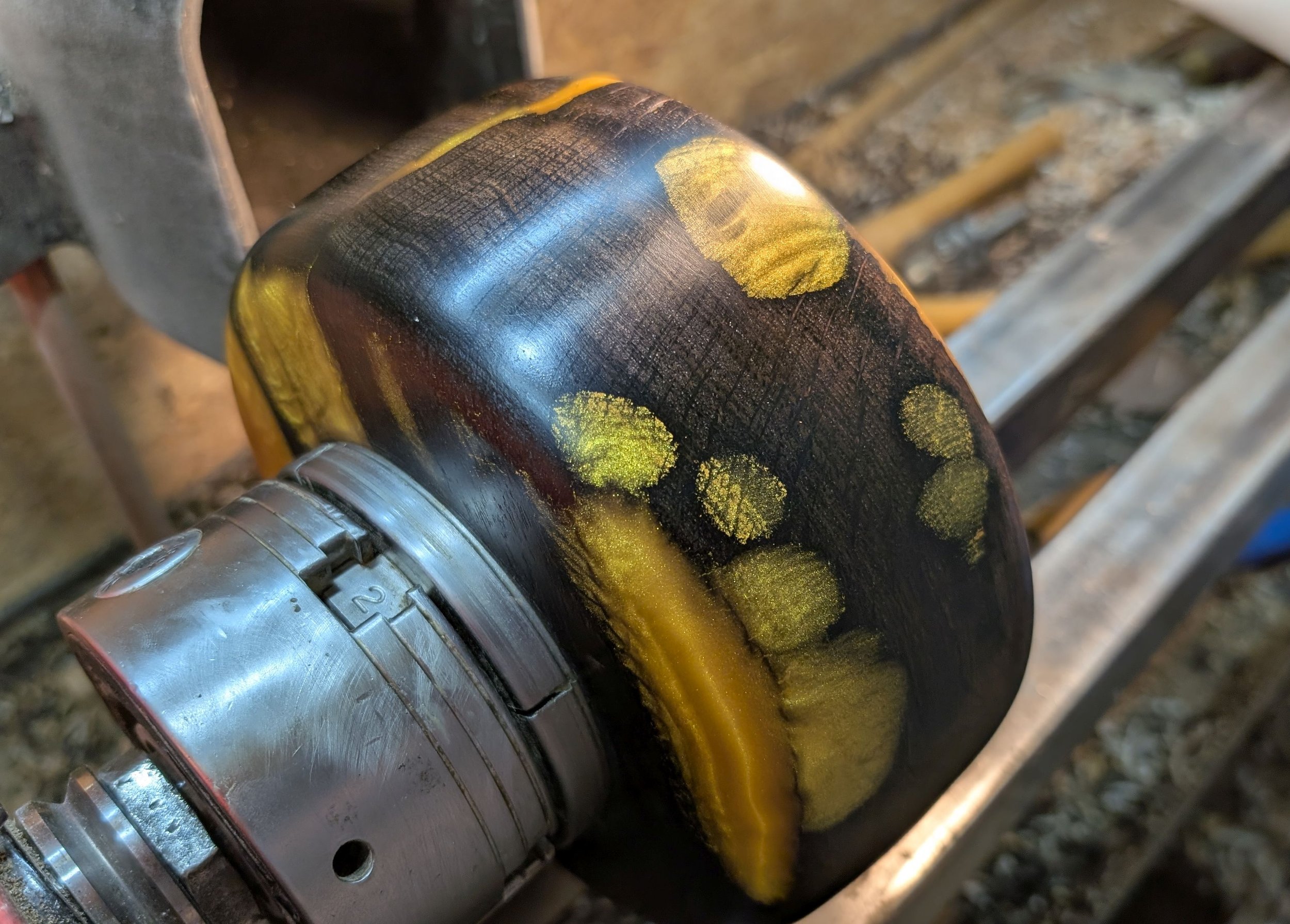 In the final polishing stage, still on the lathe