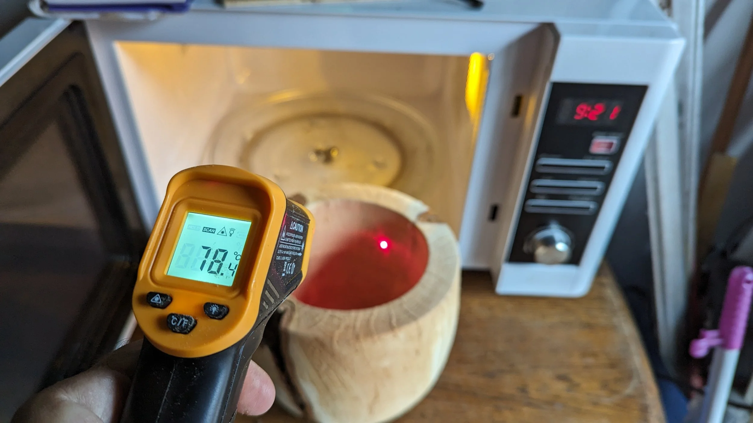 The aim is to get the surface temperature to around 60 or 70 centigrade. Heating wood this way, from the inside, produces less cracking than other methods.