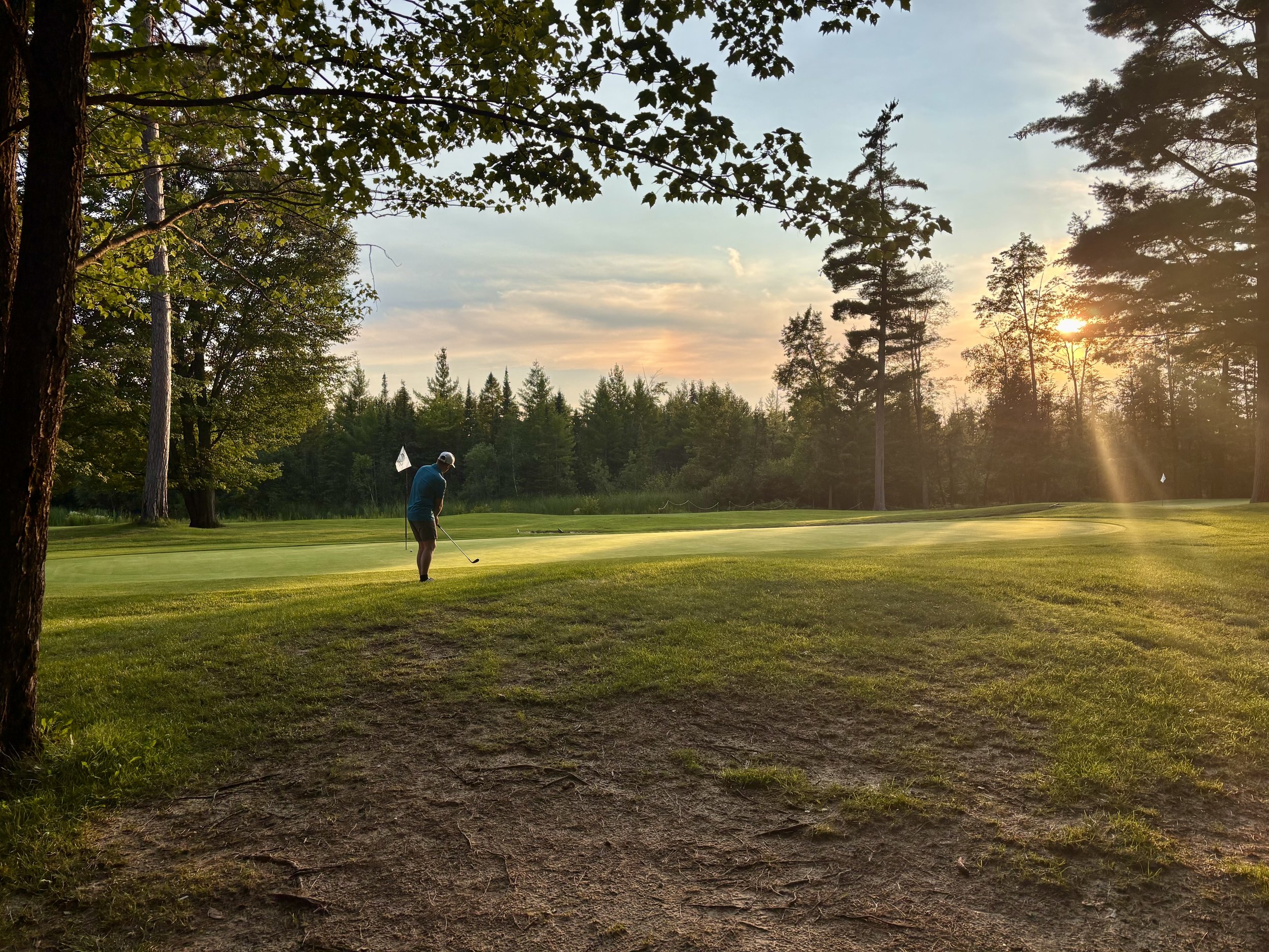 Golfer Chipping onto the Green