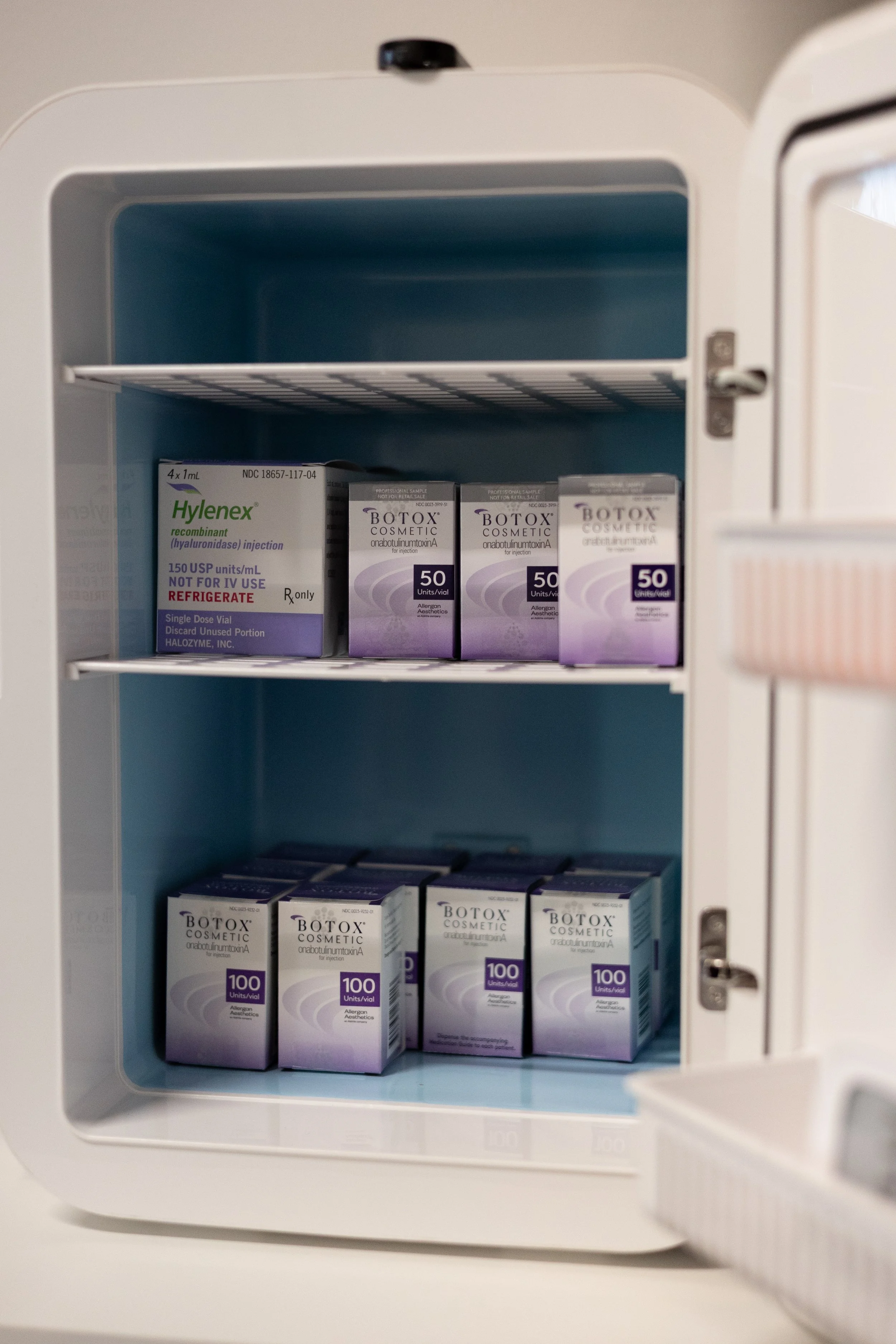 Botox and Hylenex vials stored in a medical refrigerator at Wave Aesthetics in Ann Arbor, showing safe injectable storage for facial treatments.