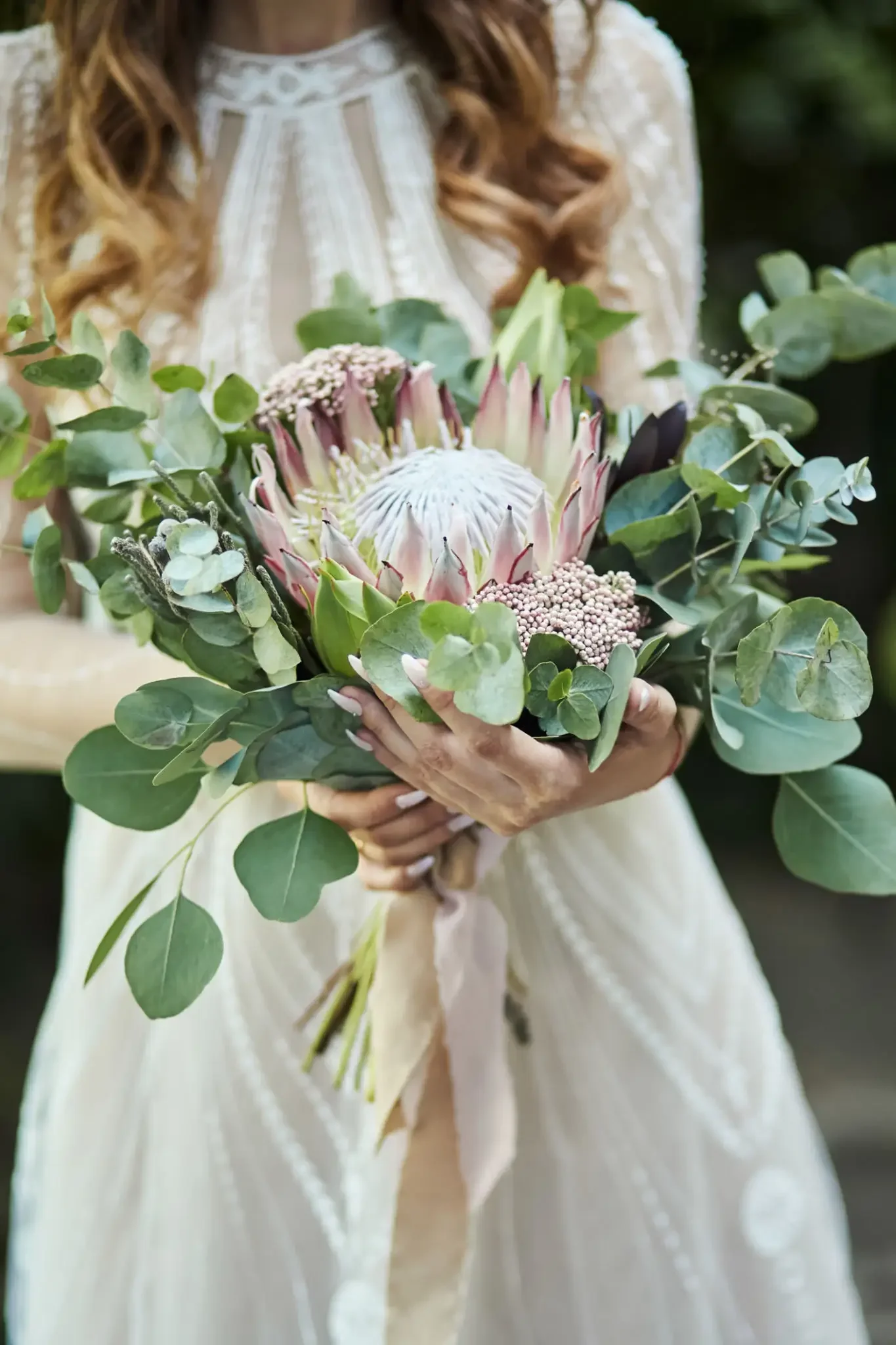 kingpinkproteaweddingbouquet.webp
