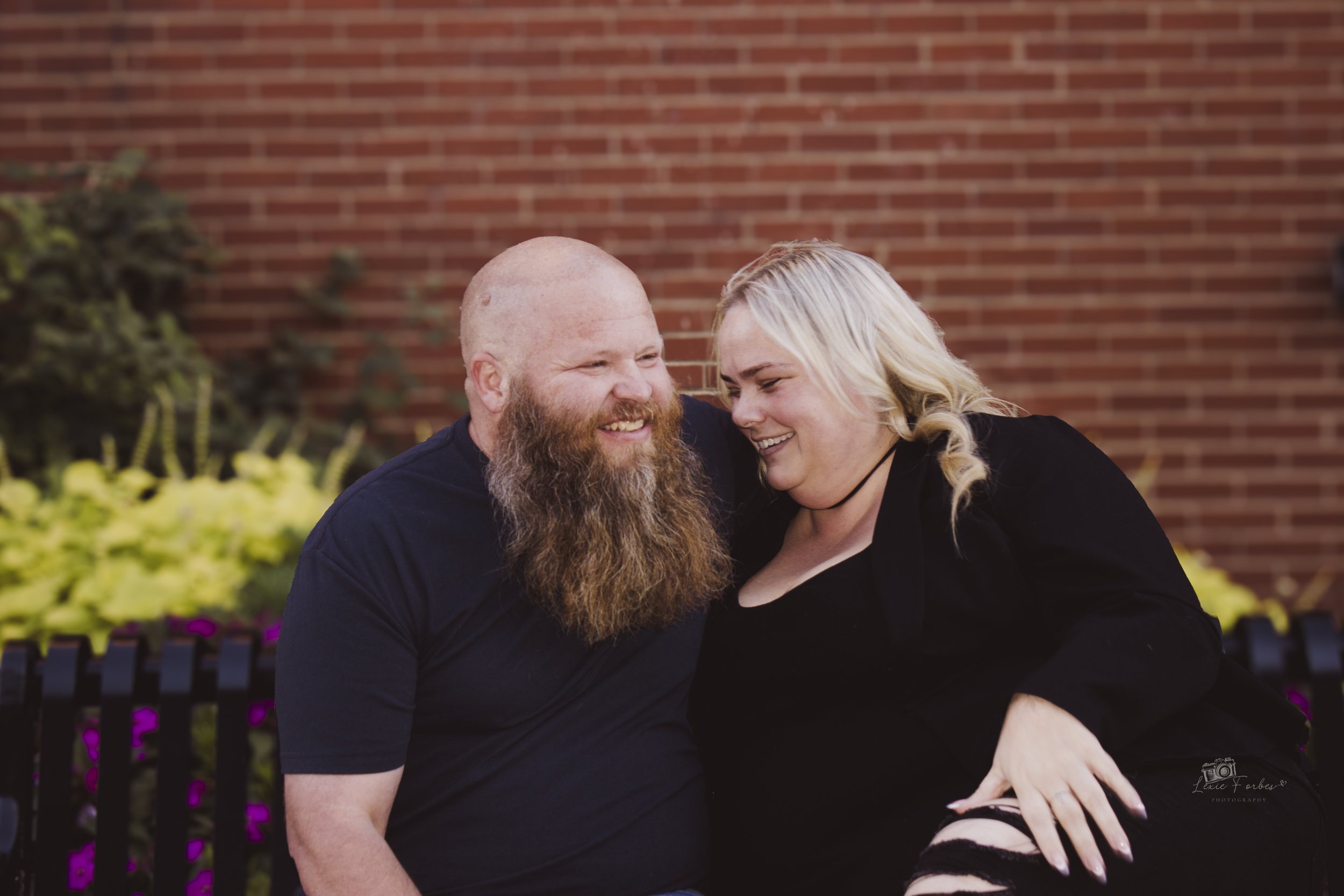 a couple sitting in downtown aurora