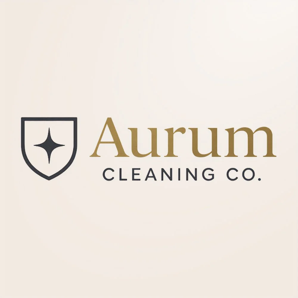 Logo of Aurum Cleaning Co. with a shield emblem containing a star.