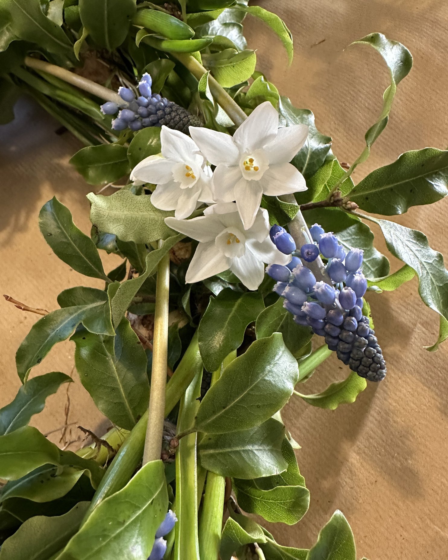 An eco wreath with spring bulbs for a biodegradable funeral arrangement